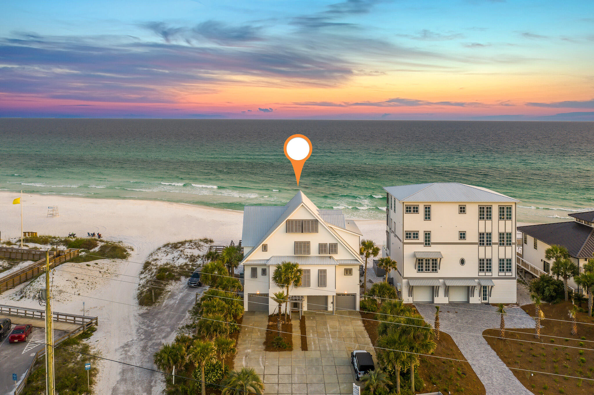 Perfectly positioned along the white sandy beaches of 30A, this exquisite Gulf view home is designed to impress the discerning buyer. Enjoy sweeping views of the water from multiple floors. The thoughtful design concept incorporates 4 of the 5 bedrooms on the gulf front side of the home with exceptional views. The spacious private pool and deck harmonize with the main living area to create a seamless flow from interior to exterior living. The well appointed kitchen includes gorgeous countertops, tiled backsplash, 6 burner gas cooktop, ice maker, and a walk-in pantry. An open floor plan concept blends the kitchen with the living and dining areas. . The entry level of the home boasts 3 garage bays and a full bath. In addition to the garage space you will find a plethora of additional parking with the extended driveways. Moving in to the 2nd floor is where you find the living/dining/kitchen previously described as well as a Gulf front bedroom, full bath, and laundry. The 3rd story contains 3 bedrooms, including the spacious Master Suite with it's tongue and groove vaulted ceilings, massive Gulf views, renovated Master Bath with soaking tub and tiled shower, and multitude of closets/storage. The 4th floor is where you'll find the bunk room with an efficient use of space leading to an exterior porch with the most grand views in the home! The home is prominently positioned on the West end of 30A adjacent to the Fort Panic beach access, preserving the land to East. Enjoy lunch or dinner at Stinky's Fish Camp just across the street or live music after the sun goes down at Stinky's Bait Shack. The West end of 30A provides a more laid back vibe than some of the more crowded 30A communities and is very close to shopping opportunities at Grand Boulevard as well as outdoor adventuring at Topsail Hill State Park.