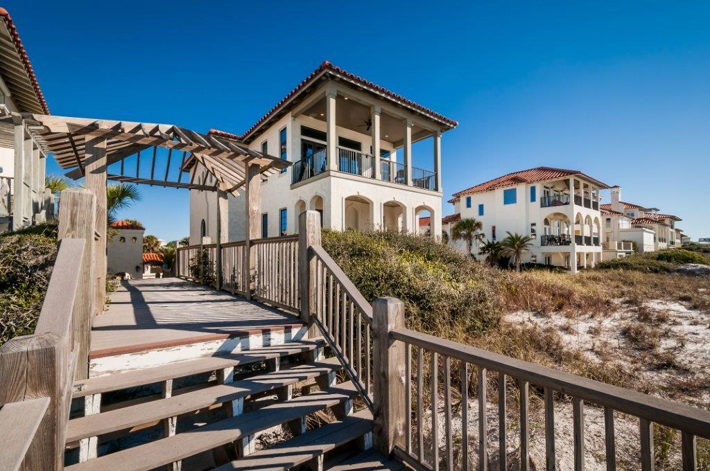 Villa Capano is an immaculate beachfront villa with endless possibilities! Entering the elevator from the garage, bringing you up to the second story 'living area'you will notice right away it's superb attention to detail with exquisite architecture and beautiful coastal decor. This 5BR/5.5BA home comes fully furnished and rental ready with all household goods included. The spacious living room has soaring ceilings accented with beautiful wood beams and boasts exceptional views of the Gulf. French doors lead to covered verandas, in every room of the house, perfect for unwinding and taking in those gulf breezes and emerald waters. With 50' of beach front, sitting adjacent to the beach walkover and just steps to the exclusive heated community pool, Villa Copano is a prime location in the Vizcaya community.  This home sits 26'9''above sea level and has been overbuilt to ensure it is structurally sound with 150 mph rated windows and well above the building code! The foundation is just over 50' deep and 18" steel rods were used instead of the standard 12" rods. This home (and elevator) were built to accommodate an additional fourth story that could be added in the future. Vizcaya is one of the few neighborhoods protected by a permitted Geotube on the beach front for added peace of mind! On the first level a 24X19' crawl space with water & electric already hooked up could be converted into a game room or such, if desired. The gourmet equipped kitchen includes an open counter overlooking the dining area, great room and the views beyond. This villa also comes with a (seasonal)  daily beach chair set up. A private courtyard equipped with a Weber electric grill or the famous Green Egg smoker are great for a cookout and entertaining guest!  Vizcaya is a sought after community featuring 32 home sites with 18 of those being directly gulf front. It is desirable for a high level of exclusivity & privacy. Nested in a very prime location on 30-A enjoy the entertainment, restaurants, and shopping at Gulf Place right down the street and all the 30-A has to offer.  See Features list for more details.  Call for your showing today!