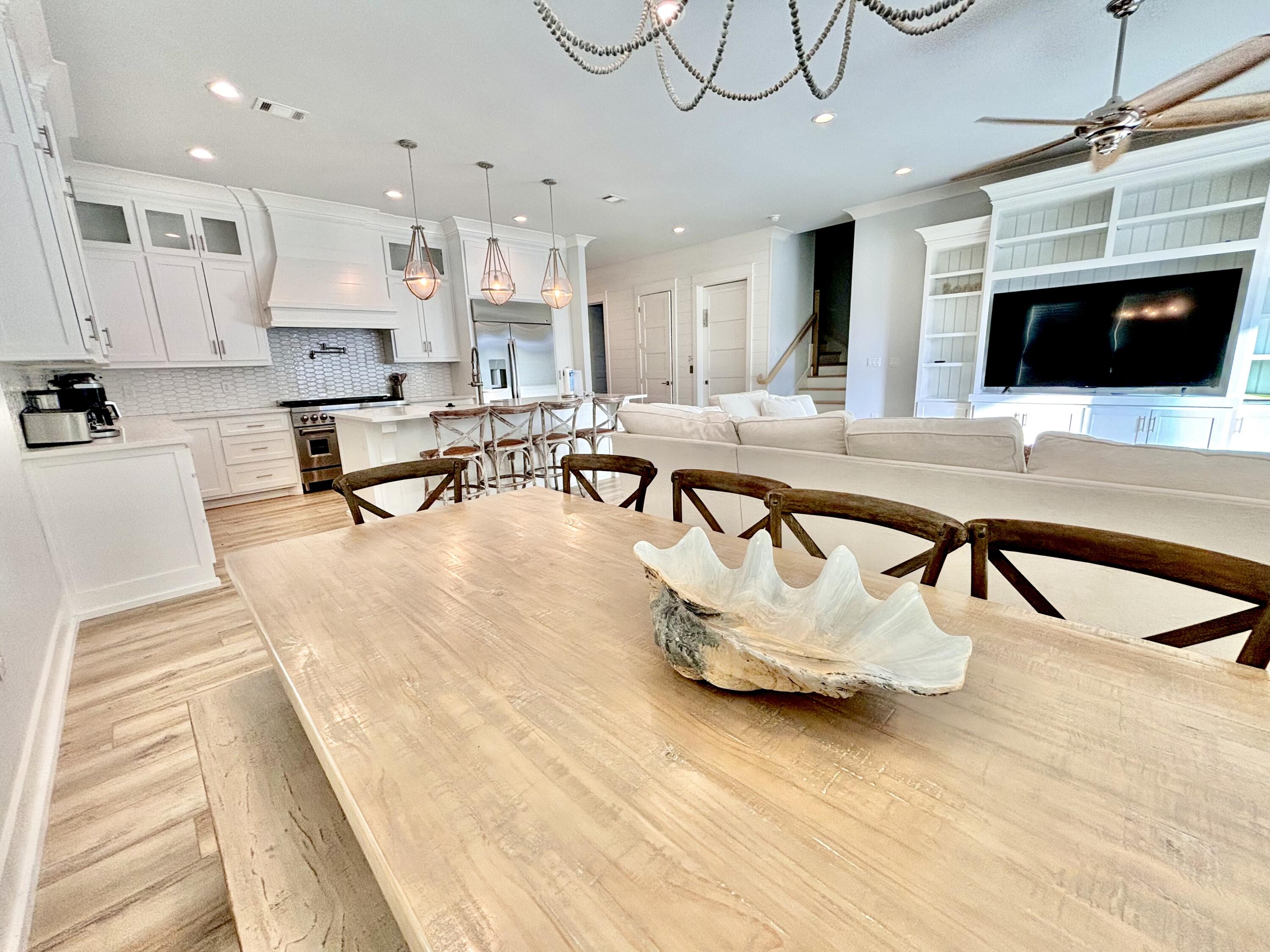 Beautiful brand new fully furnished 3,965 sq. ft. custom home on Montigo Ave in Seagrove. Featuring 6 bedrooms, 6 full baths, 2 half baths & elevator, this home will comfortably sleep 22 people. ($200,000+ rental projection) The first floor includes the spacious great room with a large kitchen for entertaining, including a gas stove, 2 dishwashers (Monogram Appliances) and an oversized island with seating for 5 guests. The first floor also includes a bedroom with a private bathroom, the main laundry room, a powder room & a detached one car garage. The second floor includes 3 guest suites with private bathrooms and a bunk room with a hallway bathroom.  The bunk room includes two queen sets of bunks and two twin size bunks for a total of 6 beds.
