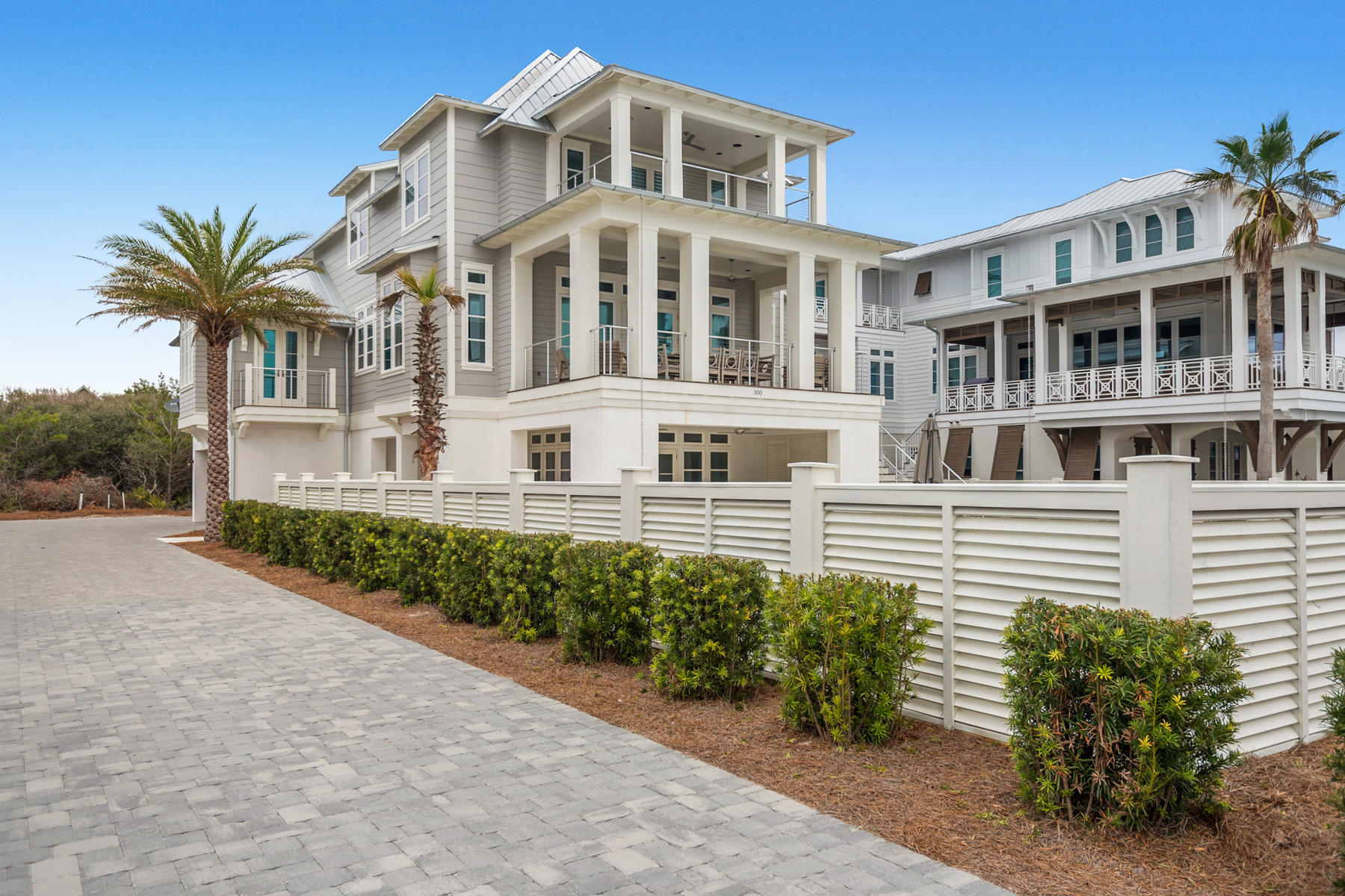 Enjoy vast views of the Gulf of Mexico from your private balcony, float the day way in your heated pool with a luxurious cascading waterfall or relax and unwind with an evening drink in your exquisite gourmet kitchen. Located in Inlet Beach, this home has a seamless flow of indoor / outdoor living from the exterior summer kitchen and expansive pool deck to the large Cabana Room where you will find classic details and a large open floor plan.
This piece of paradise also comes with finely appointed finishes such as quartz countertops, white shiplap walls, sanded Walnut hardwood floors, stainless steel kitchen Thermador appliances, a gas fireplace with Coquina shell and marble tile accents throughout. The third floor master offers breathtaking gulf views, a bathroom suite with a steam tile marble shower and a loft that leads to an additional guest room. With 5 bedrooms, 7 bathrooms, a private elevator, a spacious balcony with panoramic Gulf views, and beach access a mere few steps from your front door Ã¢â‚¬" this home is the ideal spot to live full time, as a summer home or a profitable vacation rental.

This luxury home offers space, privacy, lovely design and attention to detail as well as a prime location near the Gulf of Mexico and the historic Rosemary Beach town center. Built near Scenic Highway 30A, residents and guests will also have access to all of the shopping and fine dining the Emerald Coast has to offer.