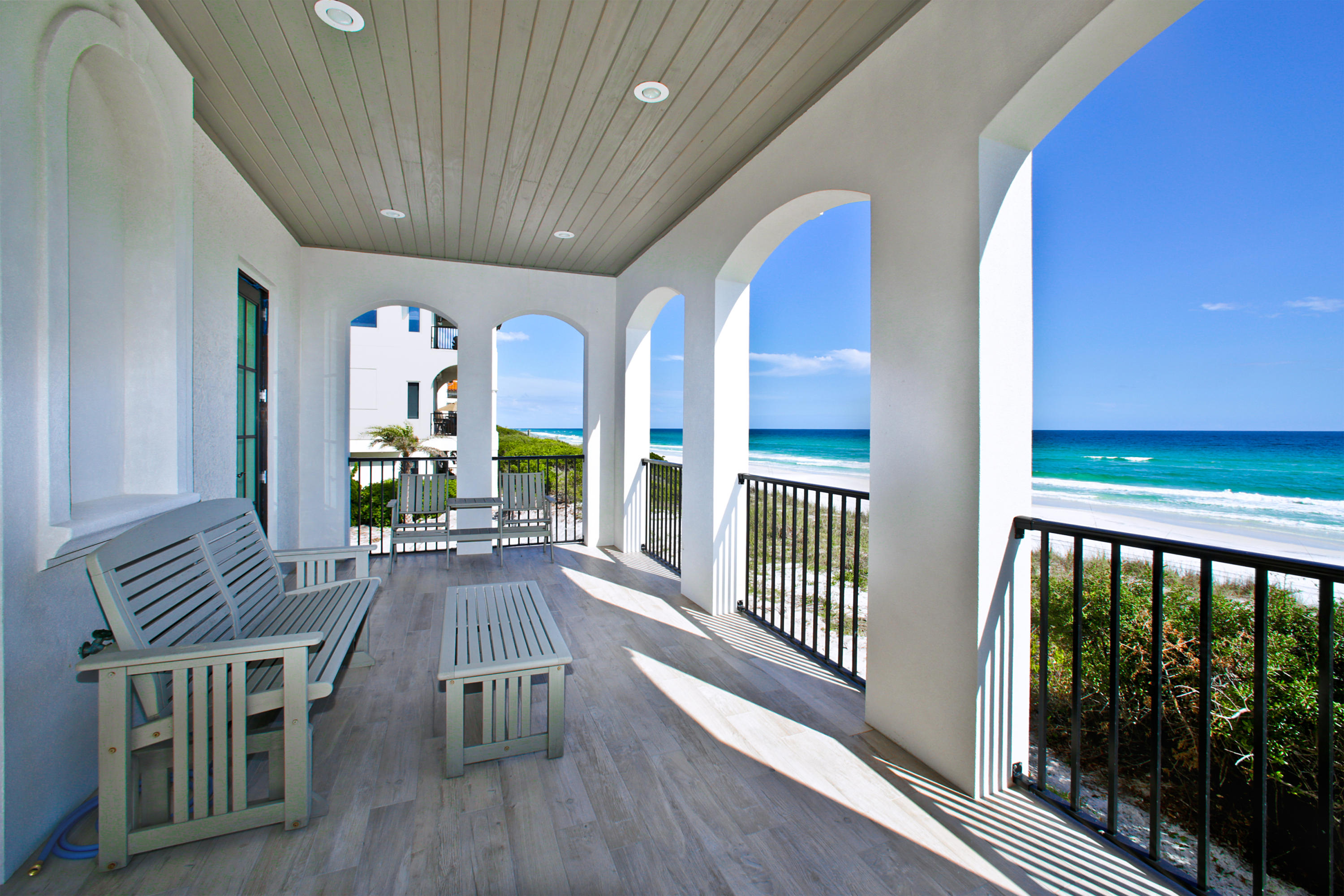 There is a contract in place with a 72 hour kick-out clause.
If your idea of relaxing includes up close and personal views of the emerald gulf waters and beach sand at the edge of your veranda, this is the luxury villa for you. The living and dining space is flanked on three sides with windows. The views to the horizon are breathtaking, and the interior is striking for natural daylight with crisp white interiors and wood beams across the ceiling. Doors open on two sides to covered porches that beckon in all seasons for all reasons -- solitude, entertaining, dining, relaxing. The fireplace will take off the chill of a cool evening, and no expense was spared in an open kitchen with lavish appliances. Every guest suite has a television, private bath and balcony access. Thoughtfully planned features like an elevator which services all levels, a sauna in the master bathroom, spacious great room perfect for entertaining with family and friends and three king beds plus a bunk room raise the bar on lifestyle as well as revenue potential. Vizacaya offers a swimming pool and concierge service for complimentary bicycles and beach chair service. Venturing into local villages, eclectic restaurants and delightful boutiques makes your dreams come true for small-town spots that rival big city fare for quality and charm. A two car garage, plus additional parking places are included, 24/7, just like the spectacular views.