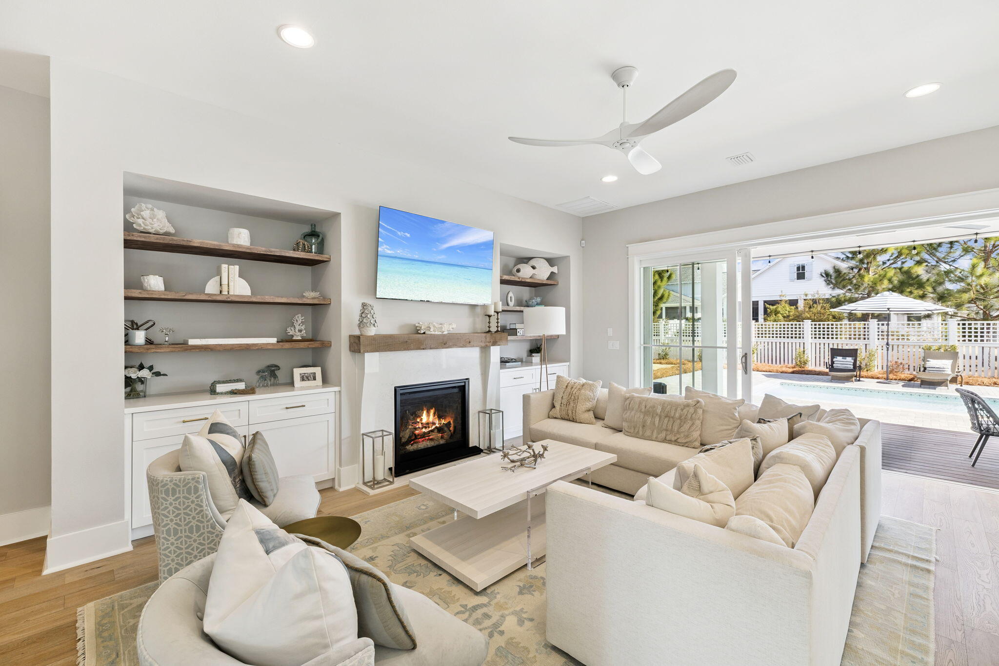Discover refined coastal living in this Romair Suffolk at Watersound Origins. A dramatic foyer welcomes you into a sun-drenched living space with 20-foot ceilings, creating an immediate sense of scale and light. The open-concept floorplan flows from a chef's kitchen--featuring Bosch stainless-steel appliances, a striking 10-foot island with custom pendant lighting, and thoughtful finishes--to the dining area and great room, perfect for daily life and entertaining.



The great room is anchored by a fireplace flanked by custom built-in bookcases and large sliding glass doors that open to a covered porch, seamlessly extending the living space outdoors. The adjacent dining area includes built-in bench seating with under-bench storage for smart, stylish functionality. Retreat to the luxurious master suite with French doors that open directly to the pool. The large master bathroom offers high-end finishes and a spacious shower equipped with a custom rain shower head. Custom California closets throughout the home provide organized, upscale storage.



Additional highlights:

- Quiet street with front yard facing neighborhood greenspace

- 400 sq. ft. unfinished bonus space ready to be customized to buyer preferences (prime opportunity to increase value)

- Move-in ready luxury with room to grow


A superb combination of elegant design, built-ins, and customization potential -- ideal for buyers seeking a coastal lifestyle with thoughtful, high-end finishes.