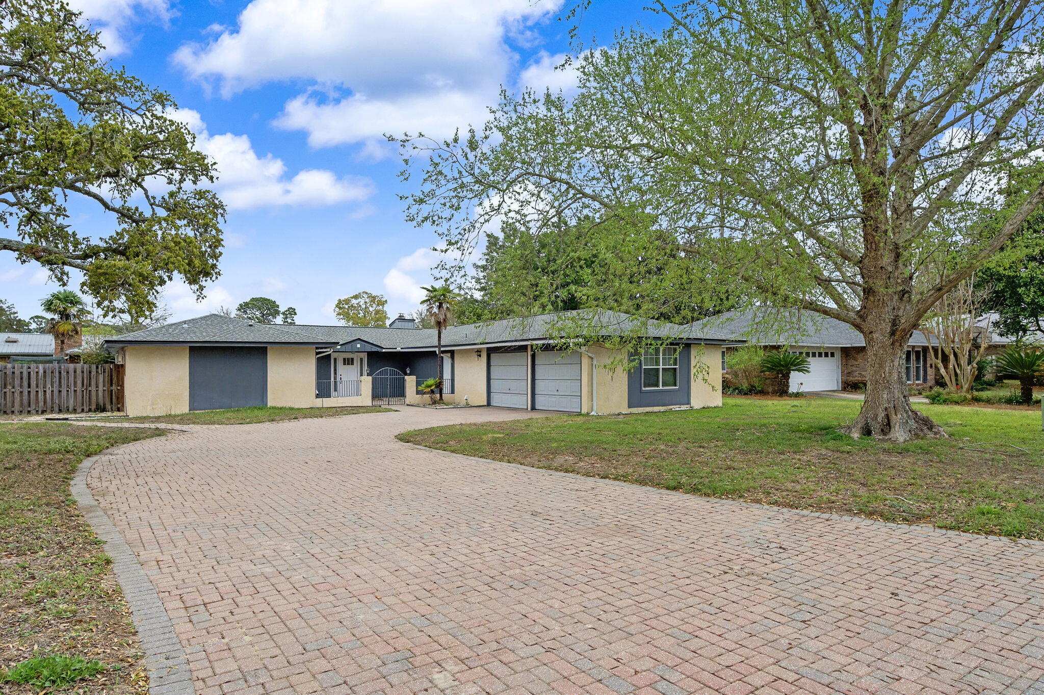 Backyard pool, spacious living, and a sought after location... this Lake Lorraine home checks all the boxes. Enjoy a large living area with a new sliding glass door that opens to the patio and your own in ground pool, perfect for relaxing or entertaining. The cozy family room features a corner fireplace and new laminate flooring throughout. The kitchen offers granite countertops, custom cabinets, stainless steel appliances including a double oven, center island, and pantry. The spacious primary suite includes a walk in closet and bath with double vanities and a large walk in shower. A split bedroom floor plan provides extra privacy, and additional bedrooms offer great space, including one with built in shelving. Homes in this neighborhood don't last long. Come see it before it's gone.