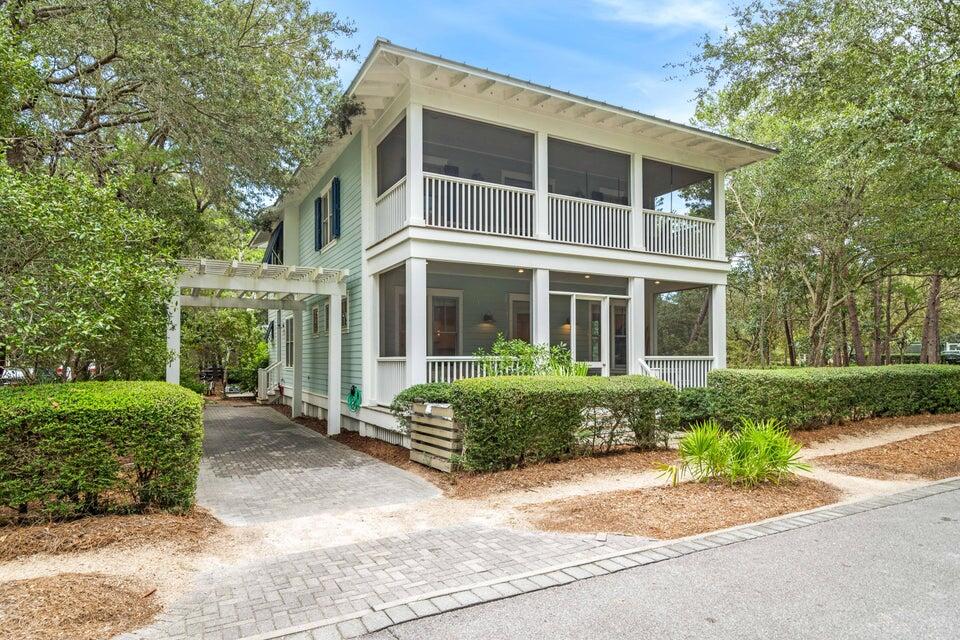 Welcome to 109 Dandelion Drive in the charming community of WaterColor. This stunning coastal residence boasts an impressive 3,584 SF of luxurious yet comfortable living space, with convenient access to some of the best amenities the area has to offer. The home is ideally located in coveted Phase 1 of WaterColor, where you can easily walk to Seaside, the Tennis Center just across the street, as well as the Beach Club, Camp WaterColor, and other nearby community pools and walking trails!

The home features 5 spacious bedrooms and 4 bathrooms, offering ample space for relaxation and tranquility. The 1st floor bedroom provides easy accessibility, and features its own private screened-in porch. The master bedroom offers its own wide private balcony, and large en-suite bath. Two more king bedrooms and a room with double bunks complete the 2nd level. The spacious kitchen is perfect for entertaining, with plenty of room for meal preparation and service. Pull up a stool at the breakfast bar, or enjoy a meal at the dining room table that comfortably seats 8. An abundance of natural light fills every corner of this home, creating a warm and inviting atmosphere for all to enjoy. For those who work from home or need a space for study or reading, there's a dedicated office providing you with your own personal workspace located on the 3rd level. Wide screened porches extend your living area outdoors, where you can enjoy the beauty that surrounds you. Perfect for multi-generational living, everyone can find a cozy spot here to relax and unwind. Enjoy privileged access to the Gulf front WaterColor Beach Club which promises endless hours of fun in the sun, and for the nature lover, walking trails and access to the picturesque Western Lake will not disappoint. Fitness enthusiasts will appreciate being able to access WaterColor Tennis Center & Pro Shop, located directly across the street! The WaterColor Boathouse offers opportunities for paddle boarding and kayaking, and Camp WaterColor is sure to be where lots of fun family memories are made! Catering to a lifestyle of leisure with a small town feel, you'll want to make this your next home away from home! From pristine beaches to excellent local cuisine, there's something for everyone in this delightful coastal town. Experience the best of Florida living at 109 Dandelion Dr... a home that offers an exceptional lifestyle in a highly desirable location