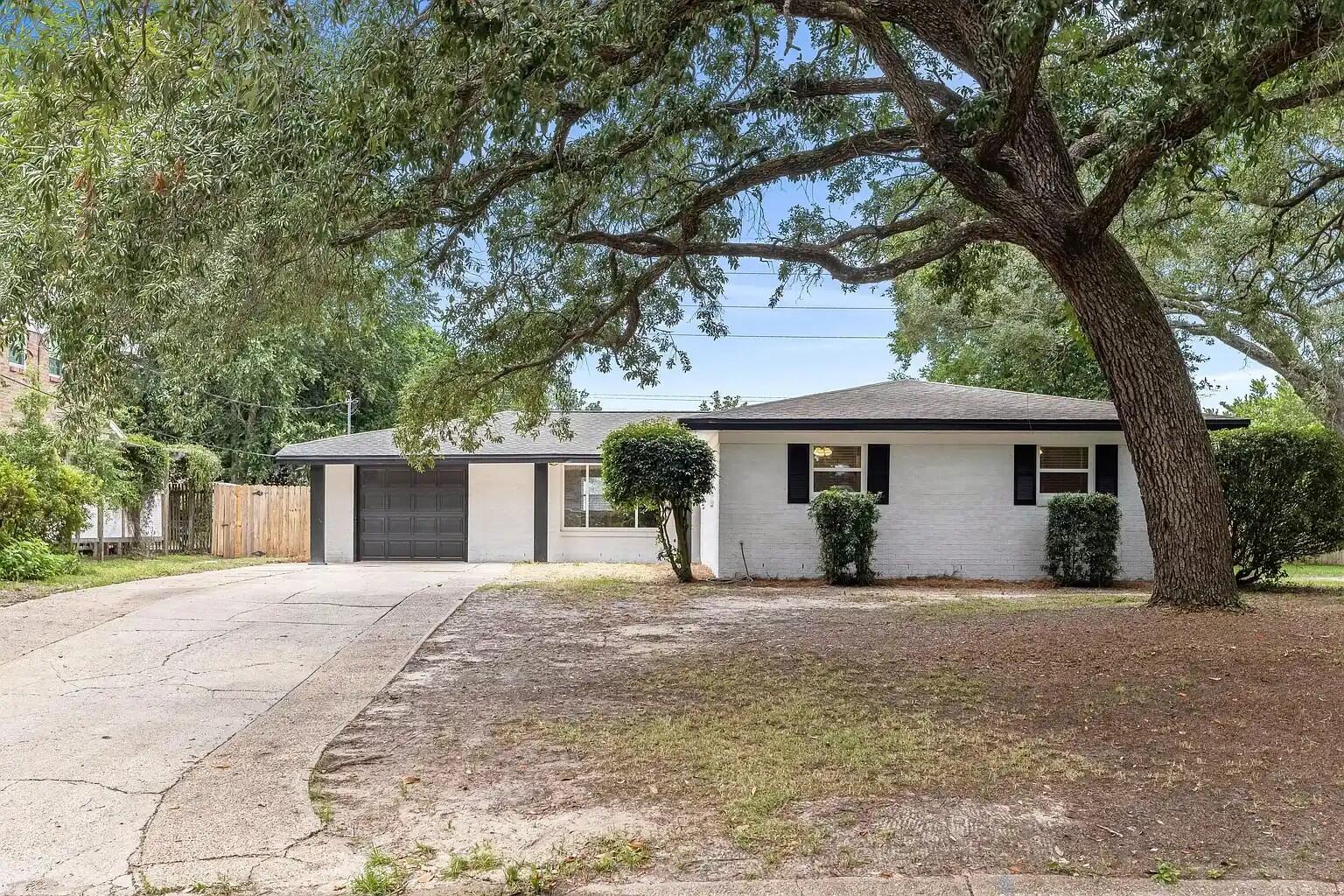 Buyer incentives available for this no HOA in-ground pool home! Seller is offering buyer credits and a washer/dryer credit with an acceptable offer, making this an even greater value.

Welcome to this updated, fully fenced, 3-bedroom, 2-bathroom home offering approximately 1,600 square feet of comfortable living space. The home features fresh interior and exterior paint, new Coretec luxury vinyl plank flooring throughout, and modern fixtures that give the entire space a clean, refreshed feel.

The spacious living room is filled with natural light from large windows, creating an inviting atmosphere for both everyday living and entertaining. The kitchen stands out with granite countertops, deep 15-inch cabinets, all-new stainless steel appliances, and even a built-in wine cooler. Step outside to enjoy the screened-in back porch overlooking your private in-ground pool featuring a newer liner. Even better, the pool is already on a weekly professional maintenance program, helping ensure it stays in excellent condition.

The property also includes a versatile detached shed equipped with water, electricity, a full bathroom, home-like finishes, and additional storage space--perfect for a workshop, hobby space, guest overflow, or creative studio.

Inside the garage, you'll find washer and dryer hookups, a utility sink, and built-in cabinetry for added storage and functionality.

This move-in-ready home offers a fantastic combination of updates, outdoor living, and buyer incentives--schedule your showing today. All descriptions and dimensions are believed to be accurate, but if important, must be verified by buyer.