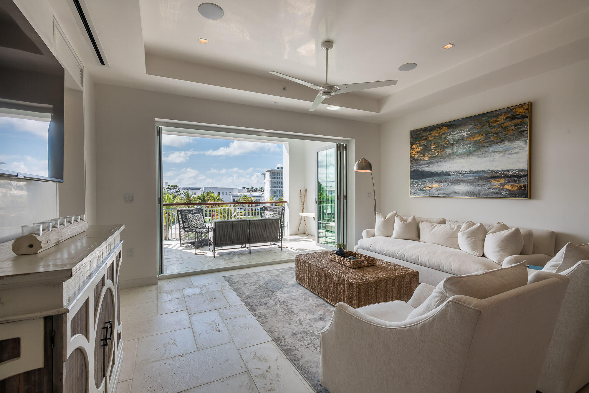 Completed in May of 2021, Whitby 202 is a professionally furnished Alys Beach Town Center 2 bedroom condo overlooking the amphitheater, Alys Beach's largest green space. A folding door system joins the covered balcony with the open layout of the kitchen, living and dining area.  

This location is great for enjoying sunsets and the many activities taking place throughout the year.  The master bedroom offers a king-sized bed and a sitting area overlooking the view with access to the balcony. The second bedroom offers a queen size bunk bed which is perfect for maximizing sleeping space. Upgraded appliances and finishes are found throughout.