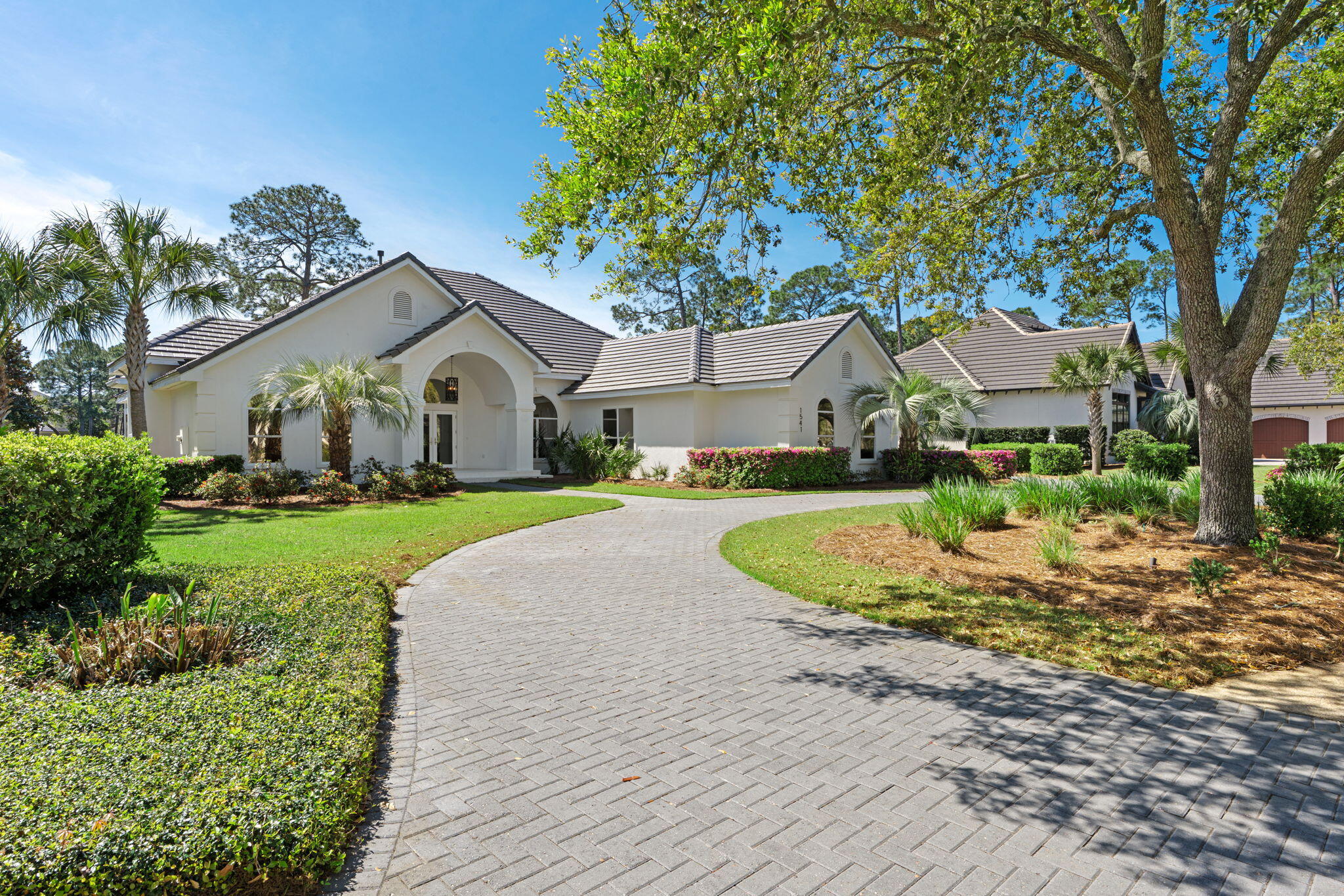 Check it out...! 
Location, Location, Location! This one level home in the beautiful gated Sandestin Golf and Beach Resort is located along the signature ''Island Green'' hole of the Raven Golf Course. Enjoy beautiful lake and golf course views from the formal living, kitchen, breakfast nook, family room, master bedroom and an additional bedroom. You will no doubt want to entertain friends and family in this 3277 sq. foot home, heated pool with hot tub and the outdoor built-in grill.