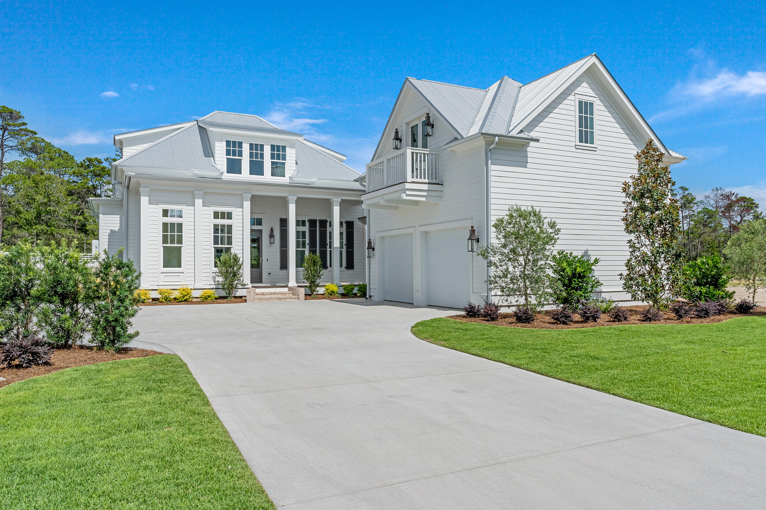 Back on Market due to buyer contingency falling through!! Step into unparalleled luxury in the heart of Watersound Origins with this stunning new construction, completed masterpiece home by Key Lime Construction, located in the highly anticipated Powell Landing East phase. Designed with the Fairweather floor plan, this home exemplifies refined modern living, combining elegance and comfort. This 3,343 square foot home features 4 bedrooms, 4 bathrooms and 2 half bathrooms, oversized driveway, plus an additional carriage apartment, providing a total of 5 bedrooms and 5 bathrooms and 2 half bathrooms.
As you enter, you are immediately welcomed by the grand open-concept living space, bathed in natural light and centered around a cozy brick fireplace, perfect for both intimate evenings and grand gatherings. The seamless flow leads to a chef's dream kitchen, complete with high-end stainless steel appliances, sleek quartz countertops, and custom shaker-style soft-close cabinetry ideal for both culinary enthusiasts and casual entertainers.
The thoughtfully designed first floor boasts the luxurious primary suite and a second bedroom, offering ultimate convenience. The spa-like primary bathroom is your personal sanctuary, featuring a freestanding soaking tub, a separate walk-in shower, and exquisite tile finishes for a true retreat experience.
With 11-foot ceilings on the first floor and 10-foot ceilings on the second, the entire home radiates an open, airy ambiance that invites you to relax and unwind.
Outdoor living is elevated to resort-level luxury with your own private pool and spa, set against the backdrop of a screened-in porch with remote retractable screens, an outdoor kitchen, and a fireplace, perfect for alfresco dining or unwinding under the stars. Plus, direct access to a convenient poolside powder room ensures every detail is considered.
In addition to the main house, a beautifully designed carriage apartment above the detached two-car garage offers an extra bedroom and full bathroom, perfect for guests or a private home office. Whole House generator, upgraded lighting, and side brick courtyard are jut a few of many additional upgrades to make this home unique!
Living in the Watersound Origins community means enjoying world-class amenities right outside your door. The Village Commons offers a resort-style pool and fitness center, tennis and pickleball courts, miles of nature trails, and dock access to the stunning Lake Powell. For golf enthusiasts, unlimited golf awaits at the Origins Golf Club, while the expansive green spaces are perfect for outdoor play and relaxation. The brand-new Watersound Town Center enhances the lifestyle with a Publix Super Market, restaurants, healthcare facilities, and more.
Don't miss your chance to experience the ultimate Watersound Origins lifestyle. Schedule your visit today to explore this exceptional home where every detail has been crafted for your comfort and enjoyment.
*Prices include lot premiums and optional upgrades. Please contact the on-site community specialists for the latest information.**