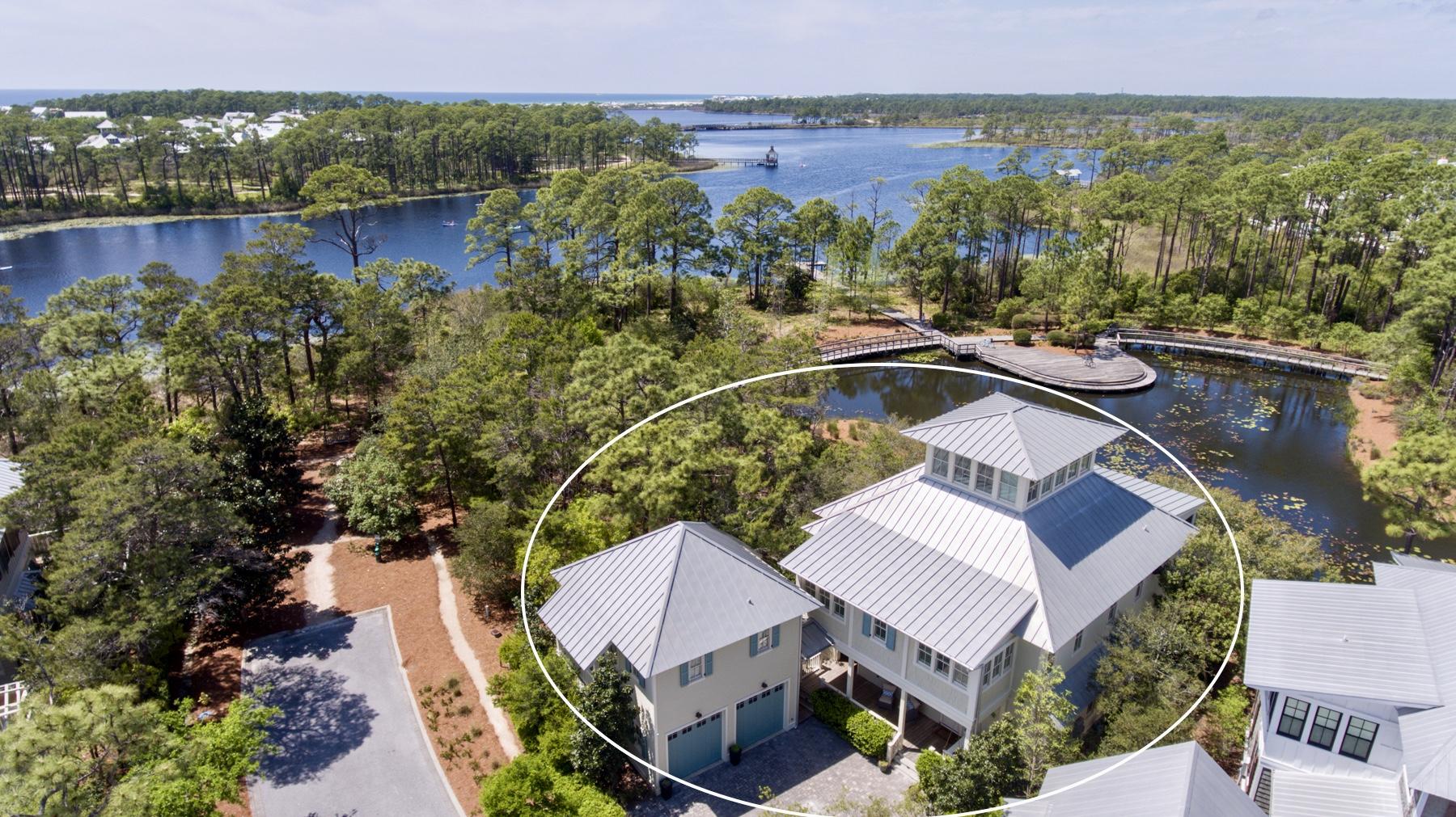 Imagine sitting on your oversized screened porch watching a beautiful sunset over Western Lake and the Gulf of Mexico with your family and friends. This house offers it all; multiple gatherings spots, an elevator to the second floor, an open kitchen and family room, and a tower to get the best view of the water from Cove Hollow. Designation for Fortified for Existing Homes Hurricane Resistance which will reduce your insurance. In addition to all this the house offers an outdoor fireplace where you have a private view of one of WaterColors most coveted ponds, a whole house generator, a separate carriage house, a security system that includes cameras that can be viewed anywhere in the world via your mobile phone. To top it off this home has hardwoods throughout, a Star Power...SEE MORE... Home Electronic Network with Elan Sound Control, surround sound with multiple Flat screen TV's. Buyer to verify all data, details and information important to them.