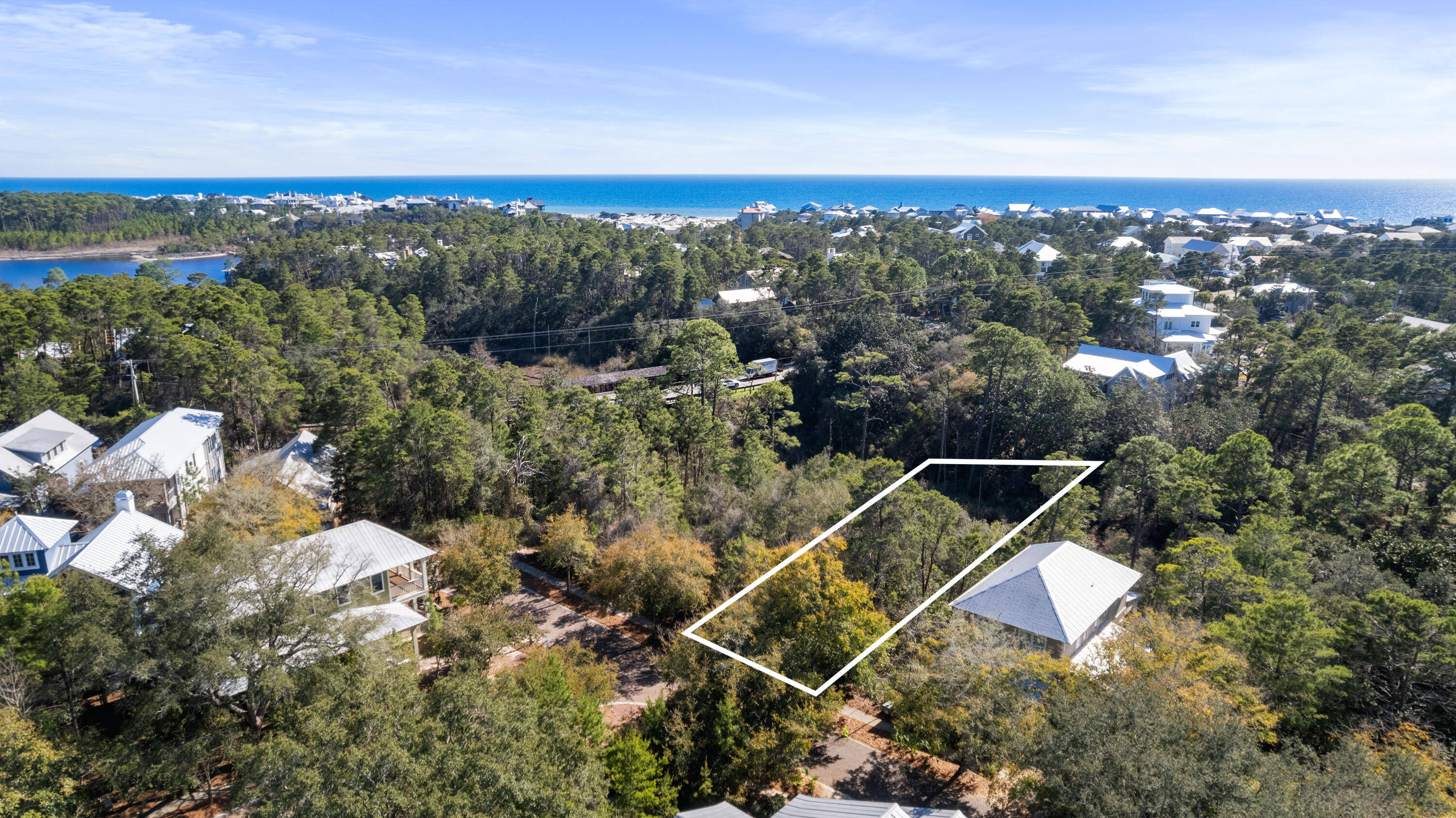 Amazing opportunity to own this lovely exterior lot in the gated community of Forest Lakes in Blue Mountain Beach! Buy today an build your dream beach home when you are ready. This sloping lot is unique in that it allows for a house plan with a mid level entry, an upper floor overlooking the treetops and a finished basement level, which is rare along 30a. Seller is a local custom builder and may consider doing a lot + home package deal if so desired by the Buyer. Neighborhood is gated and amenities include a large community pool, a green space, lake access and a playground! Multiple public beach accesses, shops and restaurants are all conveniently located nearby. Contact us today for more information!
