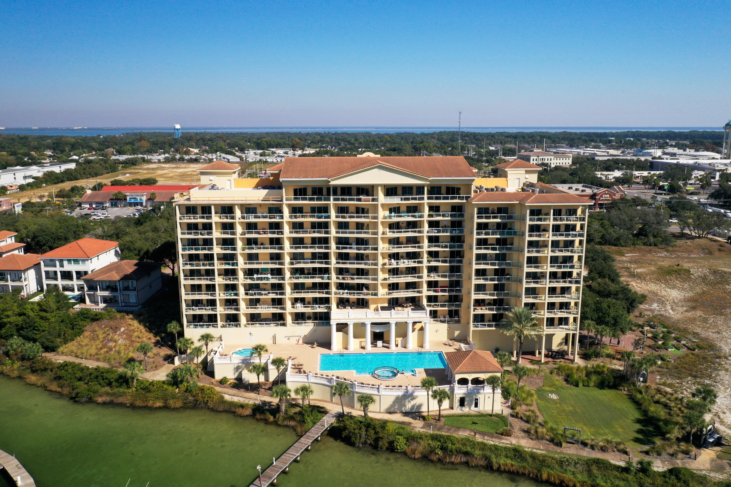 Welcome to this stunning, upscale 3-bd/ 3ba furnished condo. Ideally situated on the harbor with breathtaking views of both the harbor and Gulf. This spacious condo features 9-foot ceilings, creating an open and airy atmosphere throughout. Recently updated with fresh paint and carpet, the interior exudes a modern elegance while maintaining a cozy, inviting feel. The large windows offer panoramic views, filling the living spaces with natural light and framing the spectacular vistas. Whether you're enjoying a morning coffee or watching the sun set over the water, the views are simply unforgettable.  The kitchen is a chef's dream, complete with high-end appliances, sleek countertops, and plenty of storage.   Marbella amenities include pool, hot tub, fitness room, community room and boat dock