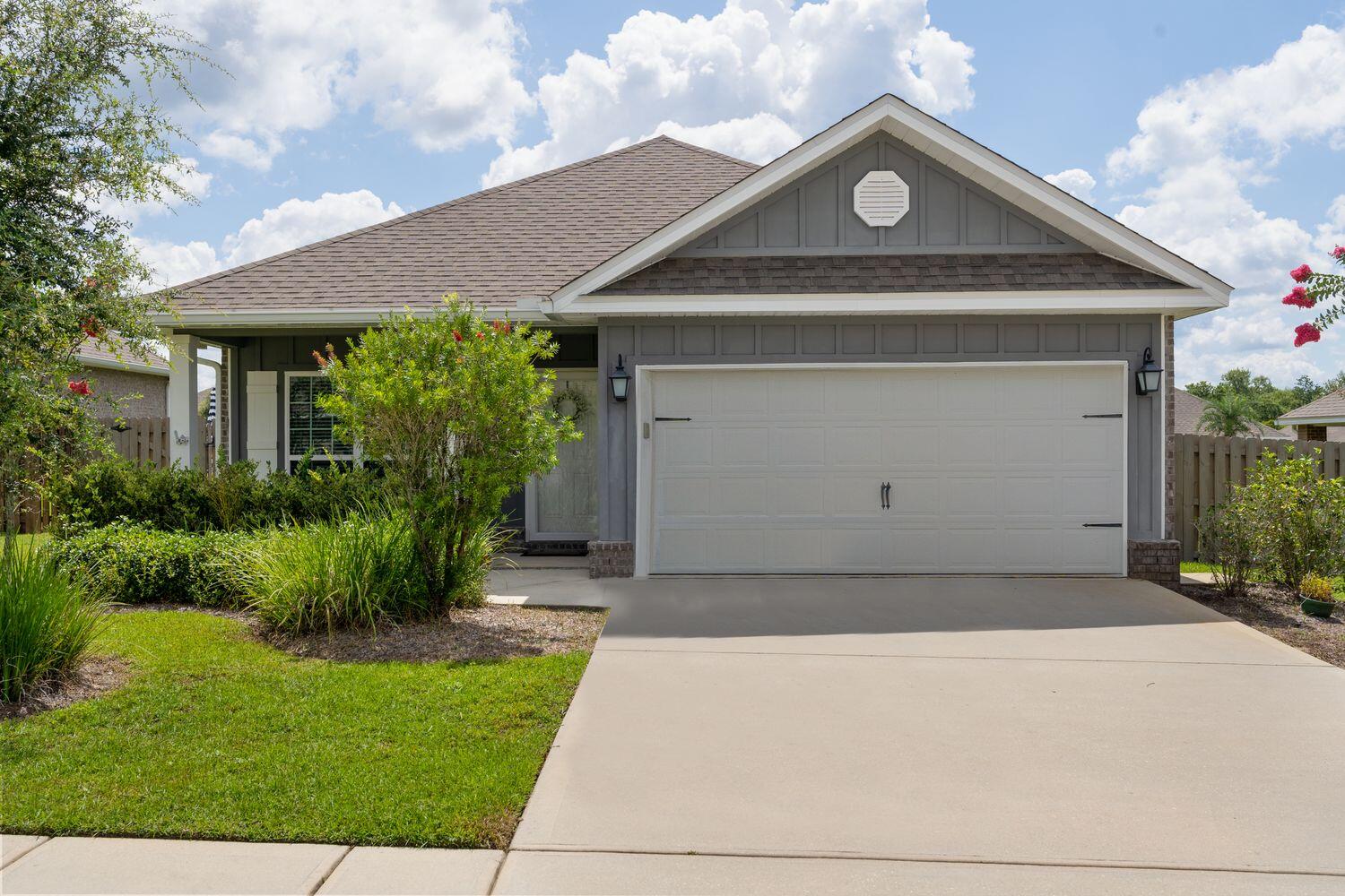 Hammock Bay Amenities are second-to-none with 3 Pools, Pickleball and Tennis courts, a country store, athletic fields, and movie night big screen to name a few. This home boasts Incredible Standard Features INCLUDED: 3 sides brick, gas hot water heater, gas stub for grill and stove, Granite Countertops in kitchen & baths, tile shower in master, Stainless Steel Frigidaire Microwave, Stove & Dishwasher, Brushed Nickel Plumbing Fixtures, hard surface floors in common areas in the home, baths and utility room, only carpet in bedrooms. Extensive Crown Molding, Designer Brushed Nickel Lighting and so much more.  Come see this great home today!
