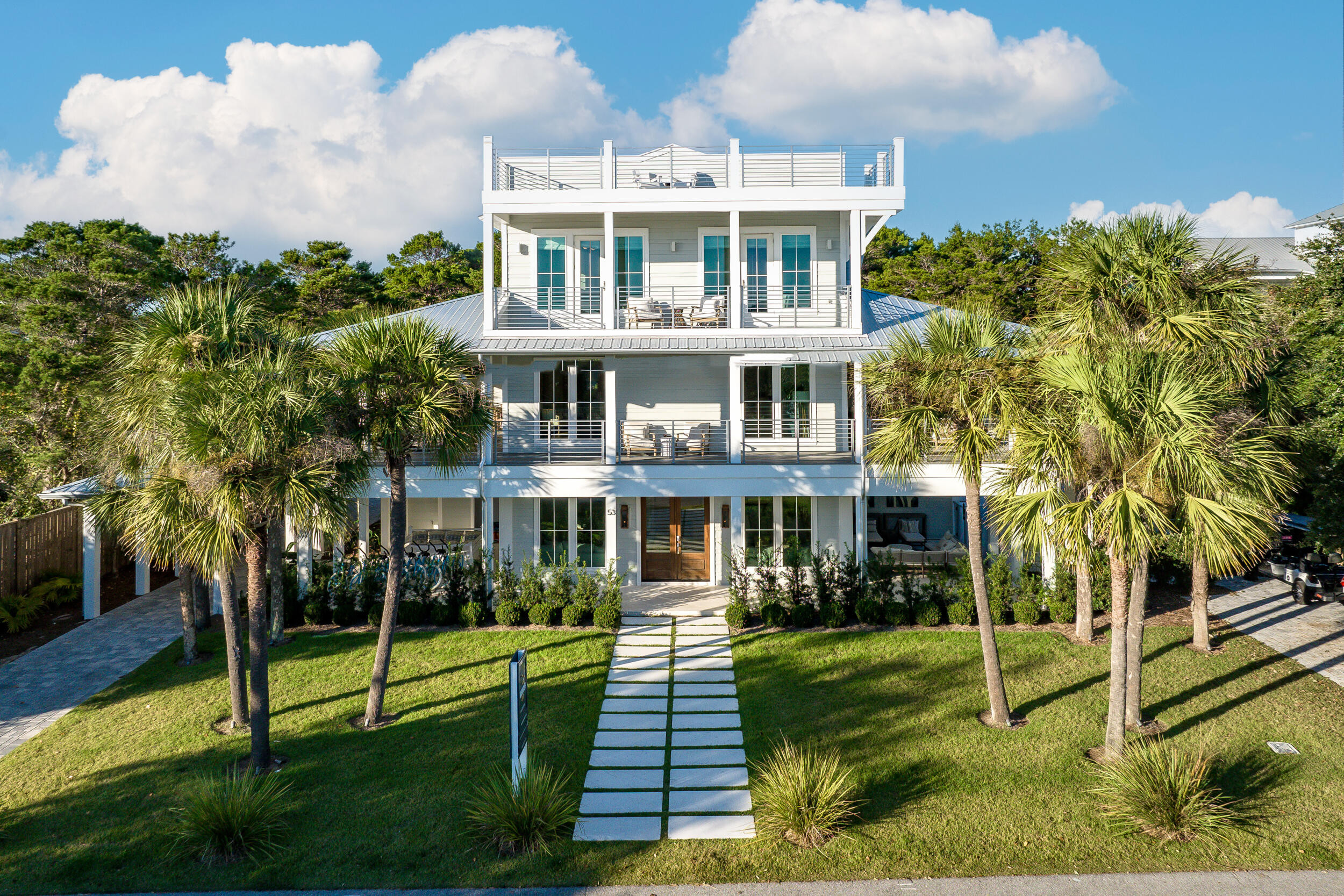 Welcome to a coastal sanctuary that combines modern sophistication with timeless beachside charm. This expansive home has been meticulously renovated over 24 months, ensuring every detail reflects quality, care, and elegance. Thoughtfully designed for multi-generational living, this property offers the perfect setting for full-time residence, an unforgettable vacation retreat, or a lucrative rental investment.
The heart of the home is its seamless blend of indoor and outdoor living spaces. Over 1,600 square feet of porches and decks extend the living area, offering multiple seating zones for relaxation and entertainment. From al fresco dining on the second-floor balcony to lounging by the large, fenced-in private pool, every corner invites you to unwind in style. The poolside area, complete with AstroTurf landscaping, a fireplace, and an outdoor TV, feels like your personal resort.
Inside, the home features nine bright and spacious bedrooms, each with its own private bath, ensuring both comfort and privacy for all guests. The rooms are all professionally decorated and fully furnished, exuding chic coastal charm. A gourmet kitchen with professional-grade appliances and expansive indoor and outdoor dining spaces make hosting a pleasure.
A fourth-floor sunset deck provides a breathtaking vantage point to soak in panoramic Gulf views, creating the perfect backdrop for cherished memories. Exclusive features like a private elevator, a game room, and driveway parking for six add convenience and luxury. 
Nestled in the picturesque Blue Mountain Beach neighborhood, this home is just a short stroll from the Gulfview Heights Beach Access. The area's natural beauty, from the swaying blue lupine flowers to its elevated Gulf views, offers a serene escape. Local attractions, top-rated dining, and charming shops are just minutes away, making every day an adventure.
Whether you're seeking a permanent coastal haven or a turnkey vacation rental, this home delivers on all fronts. Schedule your visit today to experience one of the most thoughtfully designed and luxurious properties south of 30A.  This home is being sold fully furnished.