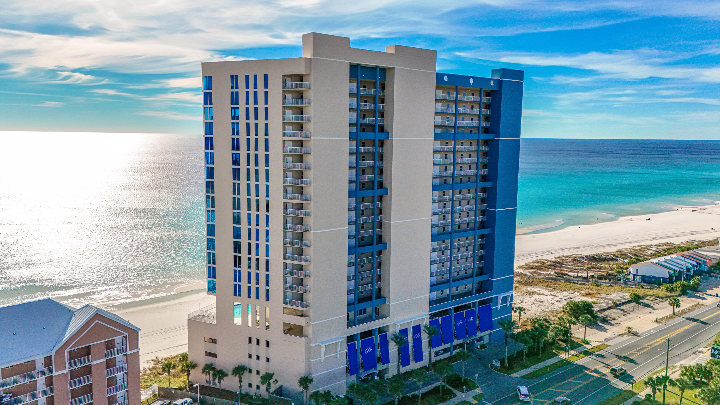 Here is your opportunity to experience Gulf-Front Luxury Living at the Premier residence of Palazzo. One of the most desirable condominium communities along the Gulf Coast. Perfectly positioned along 220 ft of pristine sugar-white sands and emerald waters. This beautifully appointed 3BR/3Bth unit has been gently used as a non-rental. Seller improvements include New Glass in all Floor to Ceiling Windows and Doors. Fresh Paint throughout and tile floor to brighten up the space. HVAC was replaced last year. Lighting and Thermostat are controlled by Alexa app. New High End outdoor furniture was added October 2025. The Kitchen is equipped with Stainless appliances, Granite counter top and an oversized wrap around breakfast bar.  SEE MORE (BUYER TO VERIFY ALL IMPORTANT INFORMATION) This 1475 sq' unit is being offered furnished. The kitchen, living and dining areas feature unobstructed Gulf views provided by the 9-foot floor to ceiling glass doors and windows that lead to the expansive private balcony Perfect for morning coffee, alfresco dining and wine sunsets. The waterfront master bedroom has private access to the balcony. Its ensuite bath features two separate vanities, an oversized walk-in closet, a jetted soaking tub, a separate shower and private water closet. There are two guest bedrooms, one with its own ensuite bathroom, a third full bathroom is conveniently located off the entry hall. The laundry room holds a full-size washer and dryer with built-in cabinetry. Whether you are seeking a primary residence, vacation retreat, or investment property, Palazzo stands apart for its strong and well-managed HOA and premium amenities, including: Gated, covered parking directly under the building (four levels), Three high-speed elevators. Elegant lobby and conference room. Fitness center with Gulf views, Heated beachfront pool and spa, Beachfront boardwalk and direct beach access, Picnic and grill area. Ideally located across from the new McGuire's Irish Pub, just 1.2 miles west of Pier Park, and only 15 minutes east of Scenic Highway 30A, this property offers the perfect balance of tranquil beachfront living and easy access to world-class shopping, dining, and entertainment. BUYER TO VERIFY ALL IMPORTANT INFO