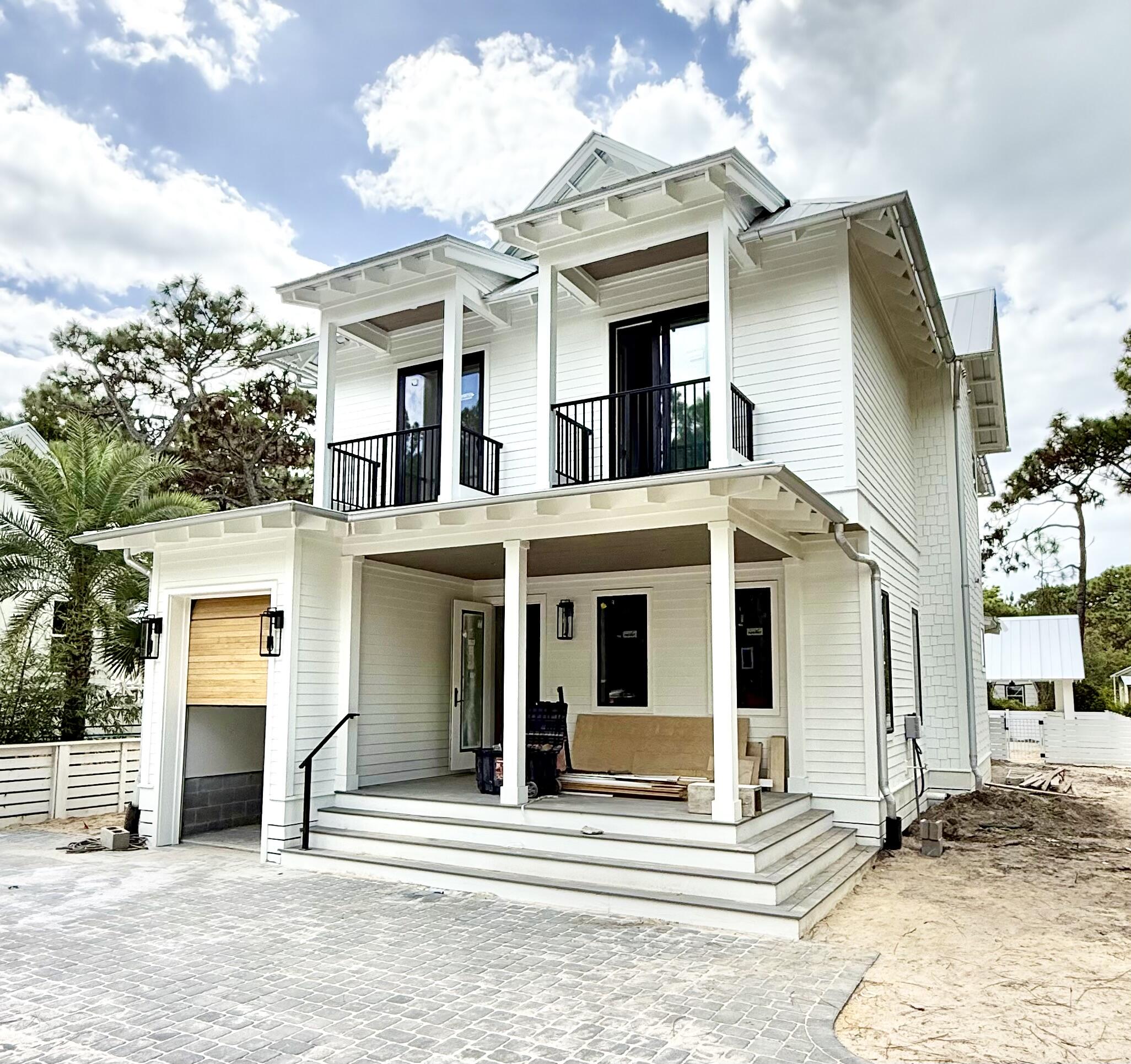 Now completed, updated photos coming soon. Offered Fully Furnished & turnkey! Photos of finished home are of a similar plan. Welcome to 80 Chelsey Lane! Gulf Shore Manor is a non HOA deeded beach access neighborhood. Along with an abundance of outdoor living space, this well thought out custom home features two Master bedrooms, one on each floor. One of the five spacious bedrooms includes six built in bunks, four fulls and two twins. Cook your heart out on the 48 inch range or outside in the summer kitchen overlooking the pool and cabana.  Brand new 6-seat golf cart to convey with acceptable offer.  One year Builder Warranty also conveys. On 360 Blue website as 'Sully's Hideaway'.