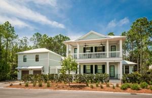 Never rented, very private Watercolor residence with 5 bedrooms, 5.5 bathrooms, a bunk room and a guest retreat over the 2+Car garage.  Conservation land to the South, a park adjacent to the North and a vacant lot across the street make this home feel spacious and secluded, an exception in Watercolor. Be sure to look at the 3D Interactive Matterport Virtual Tour in the photo section of this listing.  A covered porch leads to both the entryway and a wraparound open-air deck for soaking up the bright Florida sunshine while relaxing on the huge porch swing.  As you enter the house there is an open concept family, dining and kitchen area, a powder room for guests and a bedroom with en suite bathroom. This bedroom would be the perfect private office for those working from home. The kitchen area has a huge walk-in pantry and is equipped with a fantastic Jenn-Air Pro Style Appliance package, marble countertops and a marbled backsplash.  Off the dining room is a screened in porch, a rear deck with natural gas grill and large patio table for dining outdoors.     On the second floor are two large bedrooms that share the porch that spans the entire front of the house.  The huge master bedroom is the entire back of the house with a private deck.  The master bathroom features a huge soaking tub, large walk-in shower and walk-in master closet. There is also a sitting area/media room and cute bunk room at the top of the stairs.  Additional home features include whitewashed hardwood flooring throughout, marble bathroom countertops, tile and stone bathroom flooring with glass tile wall accents and Nest HVAC thermostats, as well as a Nest cameras at the front and side door.  This home has been meticulously maintained and gently used as a second home since new.

Walking outside to the gated courtyard, complete with gas fireplace, you'll find lots of space for sunbathing or young kids to play safely.   There is an outdoor shower for cleaning off from the beach before entering the house and putting away beach chairs and toys in the large storage room adjacent to the shower.

The guest retreat above the garage is very private with a separate entrance.   It has a full kitchen, bath, bedroom, and den with its own alarm keypad which can be turned on and off from the master keypad in the house or used as a rental with its own alarm code.   There is additional parking for two cars in front of the garage.  The Dragonfly Pool is 650 feet away and Publix is within easy walking distance. Centrally located you can bike to Seaside, the tennis courts or many ponds and lakes for kids to fish in.

Located on 500 acres WaterColor was created with families in mind and offer the charm of small-town life. Exceptional community amenities include six beautiful swimming pools, a Gulf front beach club, nature trails, a Boathouse offering kayaking, canoeing and paddle boarding, a fitness center, outstanding tennis facility, and Camp WaterColor for kids with lazy river and waterslide, parks and green spaces. 

Personal items and a few pieces of art excluded.