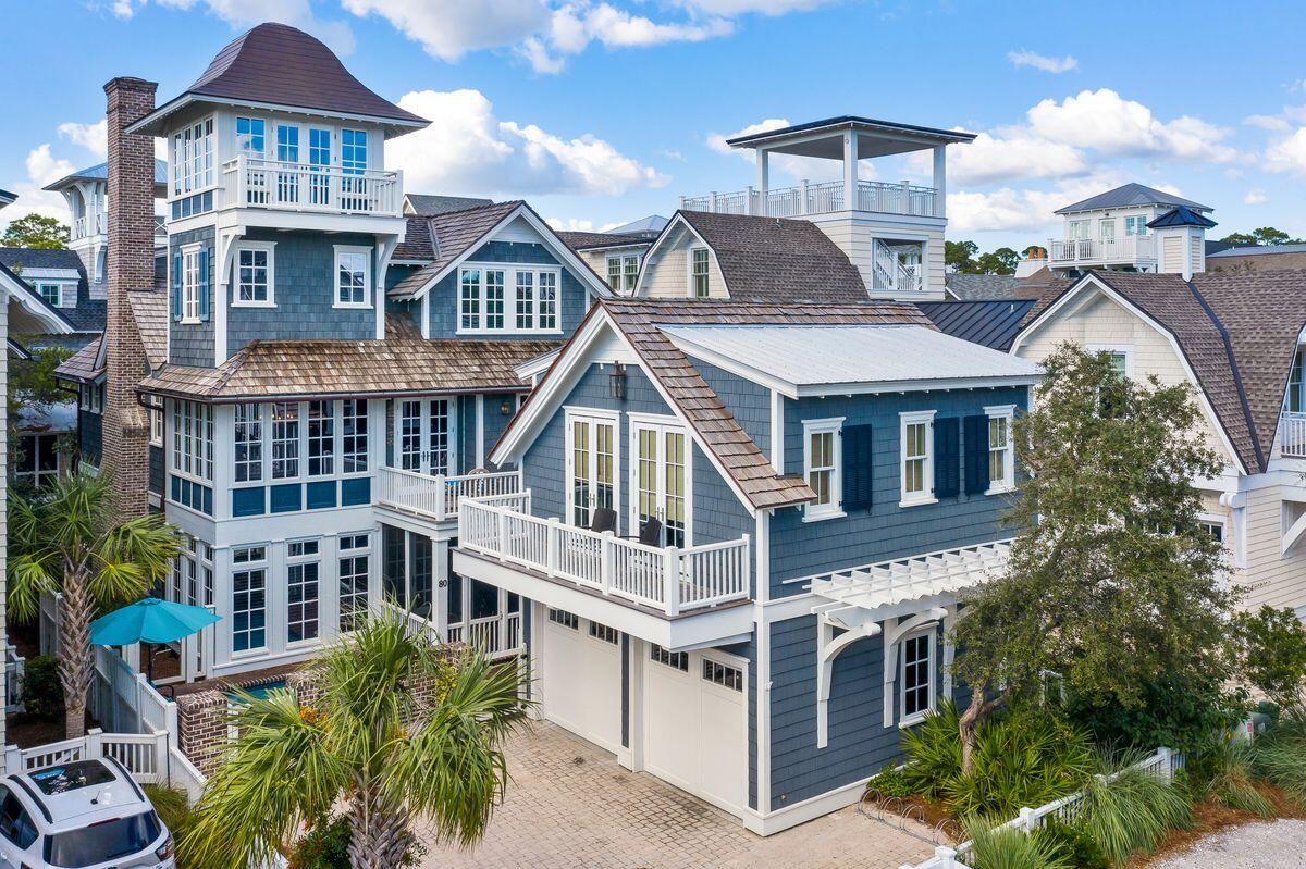 This one-of-a-kind WaterSound Beach home delivers with breathtaking sunrises, sunsets and gulf views. Featuring six bedrooms, six-and-a-half baths and 5,111 square feet of living space, this Nantucket-style home is just three lots from the gulf in WaterSound Beach. Built by Ficarra Builders in 2007, the timeless stylings of this retreat are paired with a heated pool and carriage house built in 2019, designed by architect Geoff Chick. The home has been updated with a new mesh wifi system, updated Sonos system, repainted and redecorated in bright whites, cool grays and an extended coastal palette. The home's first floor encompasses an owners' suite, spacious second bedroom, three full baths and a generous laundry room.