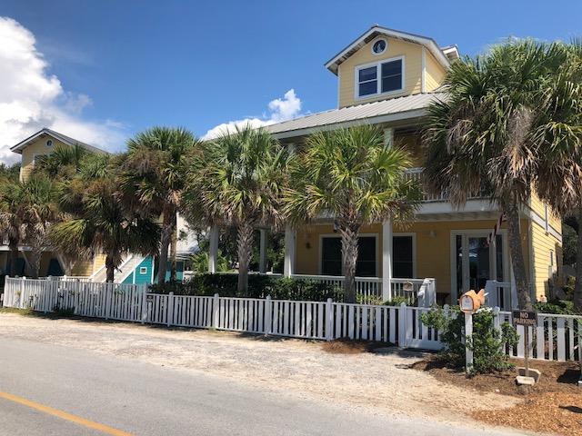 'MELLOW YELLOW' is an exclusive, one of a kind offering in Grayton Beach. Unique lot shape and dimensions allowed for custom-built, classic Florida Cottage main house with spacious courtyard/gas heated salt water pool/patio area and a carriage house. Located the lower traffic, most desirable Magnolia Street in New Grayton. Carriage house includes a spacious 2 car garage with 1/2 BA and additional storage, convenient outdoor shower and outdoor kitchen area
'cook house' . Thoughtfully designed for enjoyment and entertaining on the sprawling pool deck and surrounding patio area, covered porches of main house. Colorful, well appointed 1 BR 1.5 BA, 864 sq' interior of Carriage house features open living/kitchen/ dining area for extended family and guests. Main house is comprised of 2,605 sq Main house is comprised of 2,605 ssq', 4 BR - inc. bunk room- 3.5 BA's, with all BR's opening onto expansive porches across the front of the 2nd level or  ground level porch accessible from kitchen and living area. 3rd floor nautical theme observation tower is outfitted as a smalL den with a wet bar providing for quiet time or TV.  All within 2-3 blocks of 2 beach accesses to world renowned, state owned, undisputed public beach. Walk to the Red Bar, Chiringo, AJ's at Grayton Beach, Borago  or any of the shops and restaurants in the village. Bike to Uptown Grayton, Grayton State Park, Seaside, Watercolor.