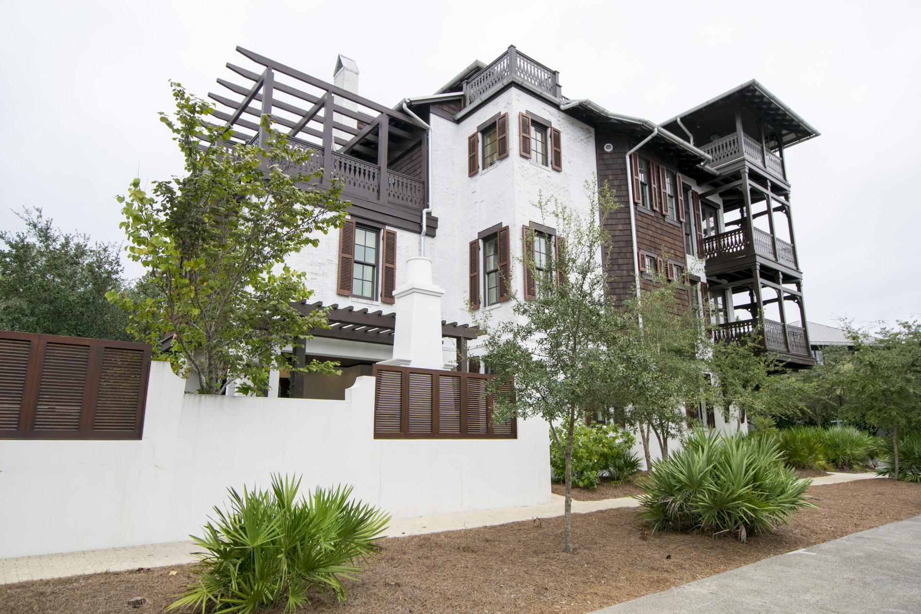 Entering through the front door into the foyer has ebony hardwoods meeting crisp white walls and a hand-forged wrought iron staircase. This is 25 Johnstown Lane  a 4 bedroom, 5.5 bath main house and 1 bedroom, 1 bath carriage house complete with two car garage. The property's antique white painted brick exteriors stand out as the end cap to Rosemary Beach's five townhouse properties. Located on the quiet northern end of the Rosemary Beach community, a short stroll to the new Owners Club and Pool at the St. Augustine Green there's no better place to call home.
The first level guest room and en suite bath set the tone of a residence with exquisite furnishings. Custom finishes abound in all areas of the property with unparalleled attention to detail and design. its a must see property Information contained within this listing such as square footage, is deemed to be accurate but is not guaranteed. Buyer to verify.