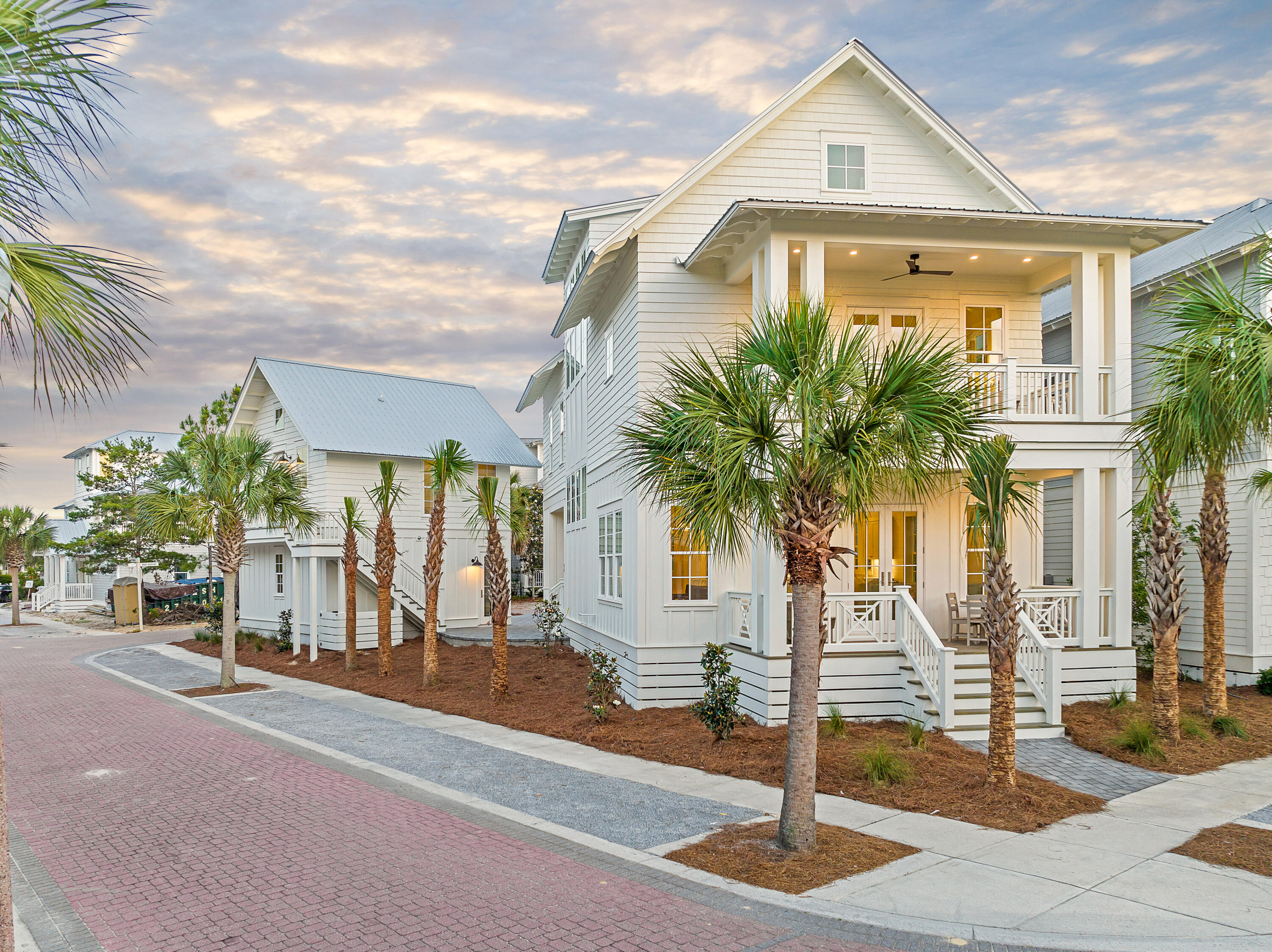 Experience the epitome of coastal luxury living with this breathtaking new construction home nestled in the highly coveted Seacrest Beach community! This exceptional 5-bedroom residence boasts 5.5 baths and multiple living areas spread across three floors, including a detached carriage house featuring its own kitchen, bathroom, washer and dryer, and vaulted wood ceilings above a spacious two-car garage.
Step inside to discover flawless design and meticulous attention to detail, highlighted by opulent finishes throughout the expansive open floor plan. Features include a first-floor bedroom and a second-floor primary suite, offering vaulted wood ceilings, an expansive bath with a walk-in shower, soaking tub, and double vanities. The third-floor's spacious bunk/living/flex area offers versatility for accommodating additional guests or a growing family, while details such as the first-floor wet bar add a touch of refinement to your entertainment space.
Embrace the coastal lifestyle with deeded beach access and seasonal tram services providing convenient passage to the pristine white sandy beaches. Community amenities abound, including 24-hour security, scenic nature walks, and an expansive resort-style pool, ensuring endless opportunities for entertainment and relaxation.
Conveniently nestled within easy biking or walking distance to Rosemary Beach, Alys Beach, 30Avenue, and other nearby attractions, residents will enjoy access to the area's premier shops, restaurants, and entertainment along 30A. Don't miss the chance to own this exquisite beach retreat and embark on an unparalleled journey of coastal living!