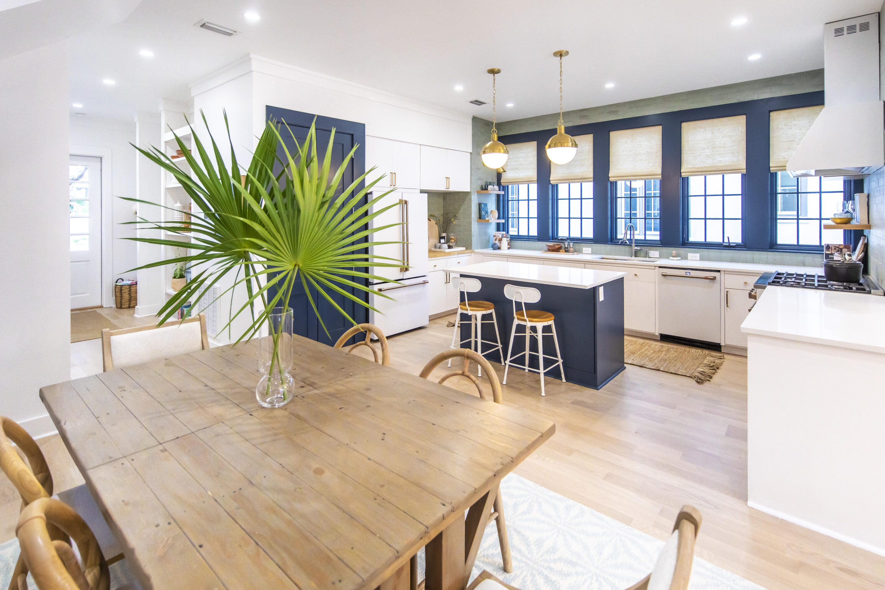 Residing on the park side in Rosemary Beach, 71 Bridgetown Avenue tells a unique story through design by utilizing various colors, textures, and patterns. As the 2022 showcase home for Real Simple magazine, this collaborative design effort challenged seven designers to transform the home into what is now the epitome of coastal cool. Upon entry, the first floor greets its guests with raised ceilings in a perfect open living plan. The modern design of this expansive kitchen leans into beachy blues and whites with updated cabinetry and luxury Café appliances with brush bronze hardware. In the living room, the story continues through whimsical pattern play that sets a cozy and cool tone within the space. A convenient first floor bedroom and full bath also anchors this space making it convenient for all families. Second floor landing allows for a flex space and separates the three private en-suites each with a private porch. The third floor has another large living space, a full bathroom and a bedroom with 4 custom built-in platform beds... a must see kids oasis! This parcel has been approved to further outfit a private pool and/or summer kitchen in the large courtyard. Prime location being just a block from town center, the Owners Club and the Cabana Pool and playground. If this is an investment, please request rental history and projections. This is your year to buy the beach house!