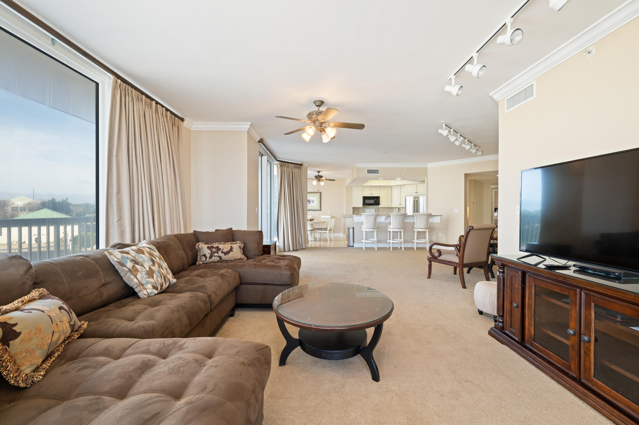 This is an end unit on the third floor on the West side of the building overlooking the lagoon pool. The 4 bedroom 3 1/2 bath is a different configuration than most. The balcony is accessible from the Master bedroom, the living room, as well as the dining room and breakfast area. Master bedroom faces the Gulf, and is on the other end of the condo for privacy. The other side of the condo has the other 3 bedrooms-bedroom  2 has a full bathand could e used as another master suite.  A full  bath for the other two bedrooms. There is also a half bath for guests. The elevator opens to the beautiful french doors to the foyer. Very spacious unit. Laundry room has it's own entrance to keep all the beach toys stored.  Verify  any and all  information important to you.