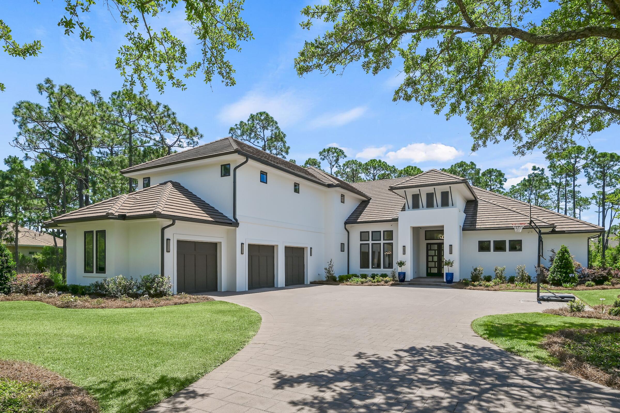 Welcome to 412 Maritime Ct., located in the gated golf community, Regatta Bay! Built in 2020, w/ designer finishes throughout, this custom home offers EVERYTHING you can think of & more! 10ft.-12ft. coffered/trey ceilings, wood flooring, quartz countertops, custom lighting, retractable sliding glass doors to create indoor/outdoor living combo, large walk-in closets, plenty of storage, en-suite bathrooms, mudroom, large laundry room (sink, cabinetry, hanging area, lots of counter space & laundry chute), double wet bar, huge pool, hot tub, summer kitchen, and a full 3 car garage etc... This amazing home offers an open floor plan with 5 beds, 4 full baths & 1 half bath for guests. Click more for more details The gourmet kitchen offers quartz counters, plenty of storage, custom solid wood cabinetry, large walk-in pantry, large island w/ seating in addition to a dining area in between the kitchen & the family room, 2 sinks, stainless appliances (built in island microwave drawer, 2 wall ovens w/ warming drawer, & a 48" gas cook top w/ pot filler). The large master suite offers a sitting area, views of the outdoor living space and a private entry to the pool. The very spacious custom master bathroom offers an extended double vanity, large tub & X-large separate tiled shower (both conveniently located behind top to bottom glass enclosure) & large his and her walk-in closets. Schedule your showing today! This home won't last long!