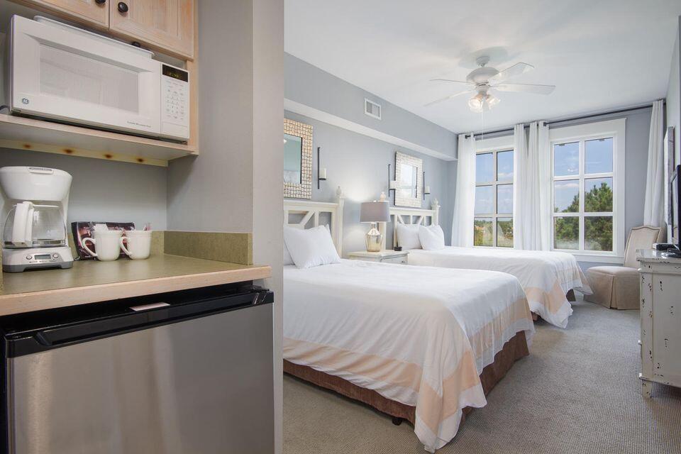 FULLY FURNISHED WITH ALL UTILITIES INCLUDED! Available for a six-month lease beginning as early as August 1. This studio condo is located in the heart of the Village of Baytowne Wharf which means you'll have convenient access to several restaurants, retail shops, and fun entertainment options just outside your door! New updates abound in this studio including a new queen mattress, LVP flooring, fresh paint, bathroom vanity, and a new AC unit. The Pilot House amenities terrace offers a resort style pool, hot tub, fitness center, BBQ grills, and a beautiful green space.  Come relax and enjoy the resort lifestyle!