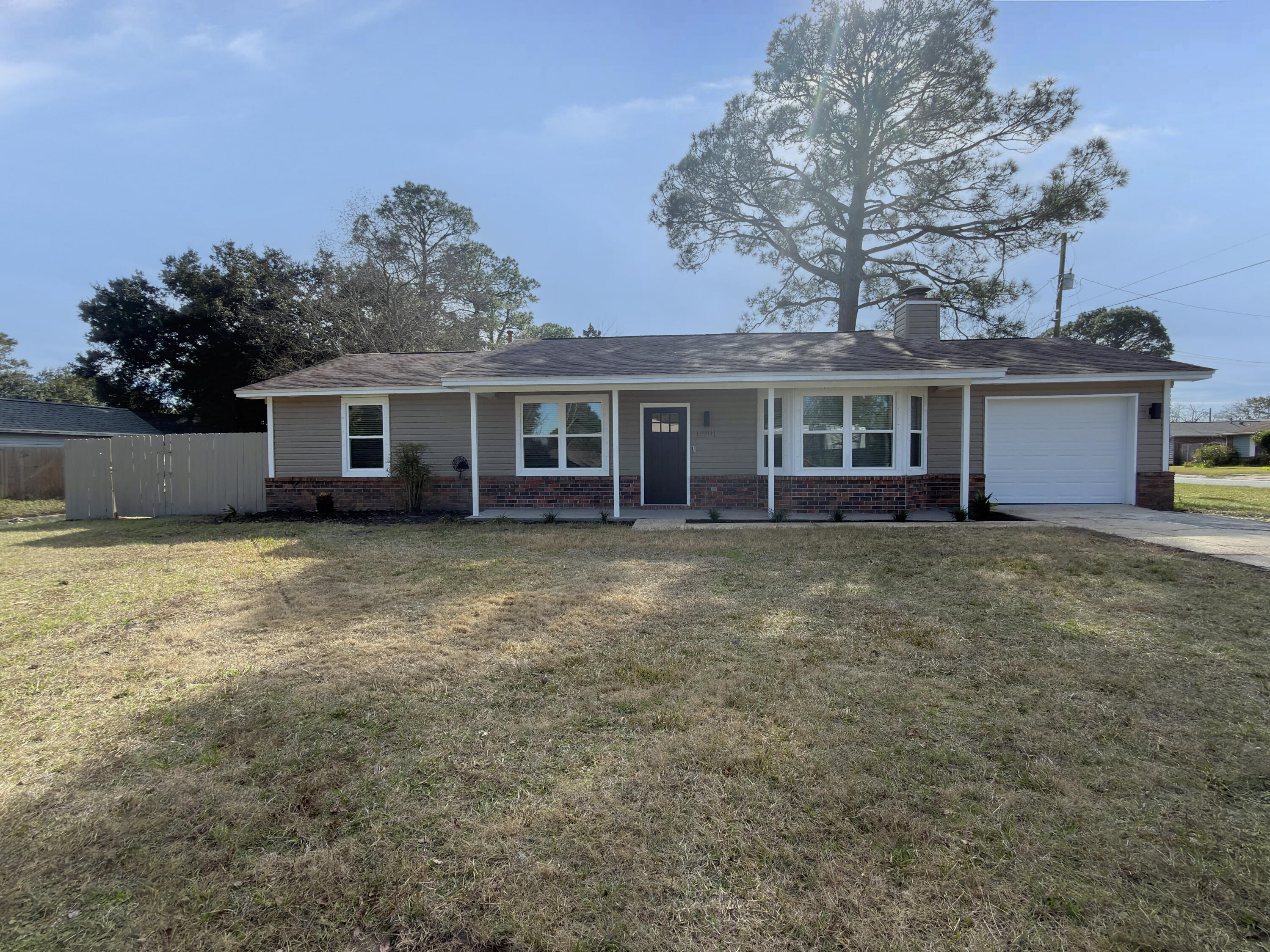 You will definitely want to see this updated REO home. This 1260 square foot opportunity features three bedrooms and two baths with significant interior upgrades throughout. You will start off on the right foot with fresh paint, modern fixtures, and brand new stainless steel appliances already in place. With matching granite tops in the kitchen and baths, a generously sized master bedroom with a tiled shower in the master bath, and a walk-in closet, this home boasts a 'move-in' vibe. Featuring new 2-inch faux wood blinds throughout, sleek black hinges and door knobs, a painted garage floor, and a new garage door with an opener—plus a privacy-fenced backyard—this home is definitely one you will want to check out before it's gone.