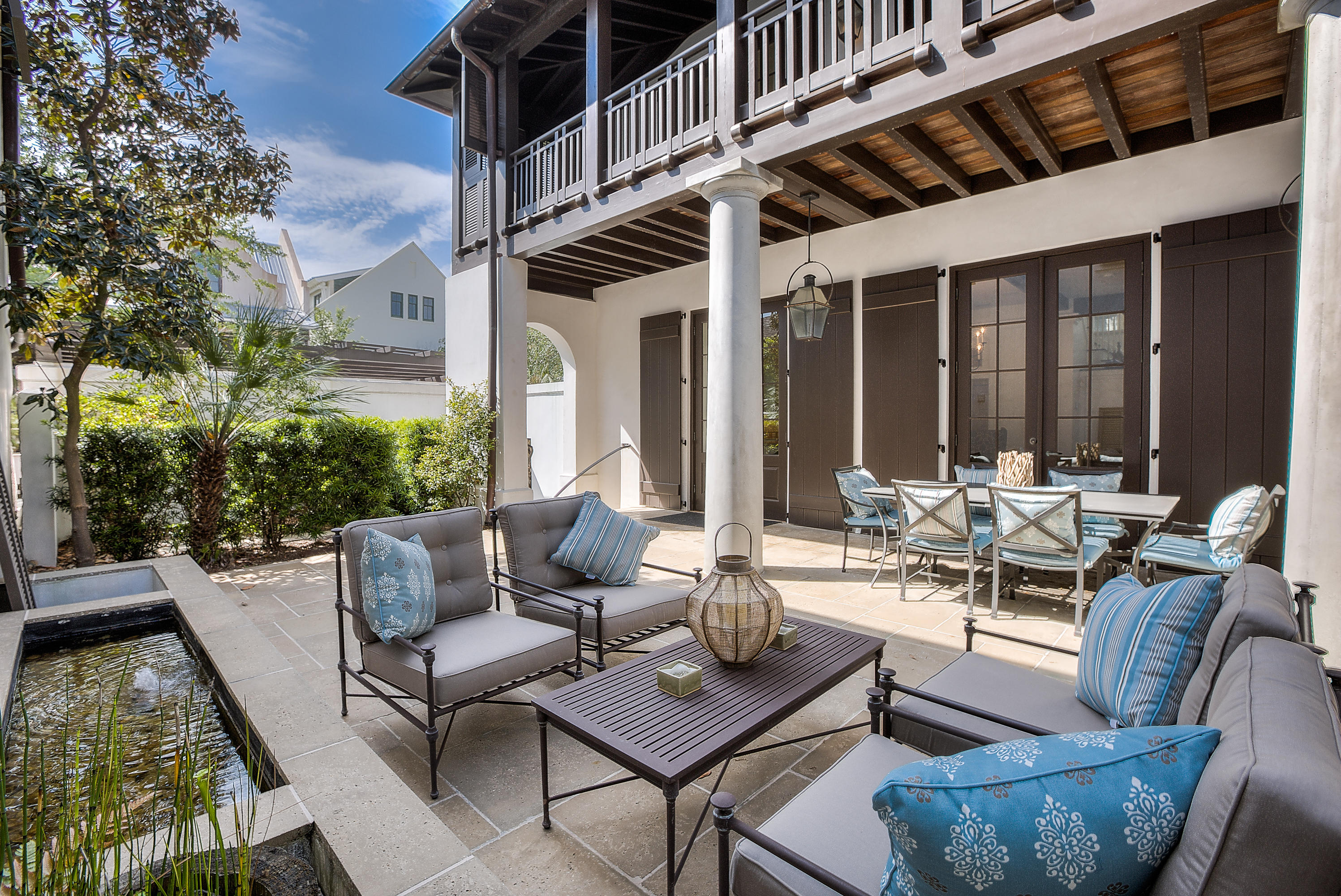 First time to the market, this Eric Watson/Architect, home located on the boardwalk, south of 30A in Rosemary Beach, constructed by OB Laurent is ready for you. The arched doorway entry from the boardwalk leads you to the elevated, private courtyard with lighted fountains and a covered loggia that connect you with three massive French doors to the Living, Dining and Kitchen areas. This seamless indoor outdoor living is complemented by Peacock Pavers inside and out, solid mahogany doors with Phantom screens built into the molding of all exterior doors, Kolbe windows and architectural molding throughout. The kitchen counters are Jerusalem Gold limestone, Viking range and microwave Subzero refrigerator, Bosch dishwasher, Shaw farmhouse kitchen sink and glass front cabinetry. The interior finishes are stunning and the architectural details are many, for example: the multi-story grouping of casement windows that assist the three story floating staircase to the master retreat with private shuttered porch and three guest rooms, sleeping porches, not to mention the fireplace, Carrera marble basket weave flooring, Ipe decking, Carrera marble counters in all baths, walk-in laundry room and the extensive finished attic storage. Other construction points of interest are, Stucco on block with rebar and concrete infill, Cedar shake roof with copper gutters and flashing, Hurricane grade windows and construction, Geothermal heating/air with lines already in place for carriage house, and Structural carport carriage house ready. This home is one to be experienced. Offered furnished.