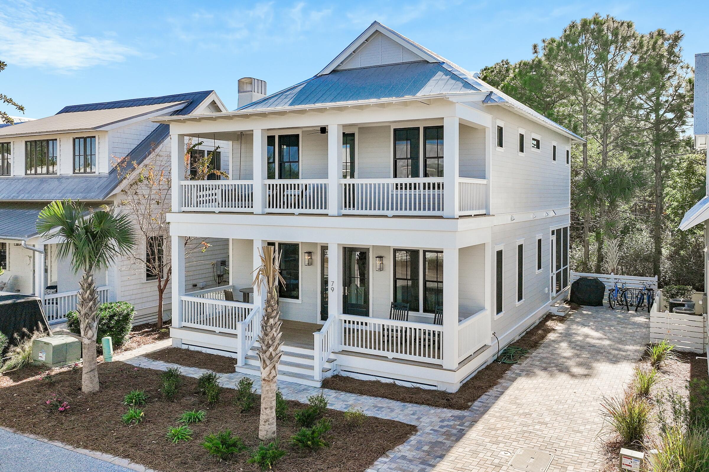 Fantastic opportunity to own one of the newest homes available in Cypress Dunes on Scenic 30A, with a recent price improvement! Experience the ultimate in coastal living with this fully furnished 4-bedroom, 3-bathroom masterpiece, including a first-floor bedroom and full bath. Every detail of this home has been thoughtfully designed to deliver the perfect balance of comfort, elegance, and functionality. The Gardenia floorplan has been modified to allow for a larger, more open living, kitchen, and dining area. This owner added a chef-inspired kitchen with a fully upgraded appliance package, including Wolfe stainless steel gas cooktop, double wall oven, and Sub-Zero refrigerator. Additional upgrades include a tankless water heater and thermostatic controls in the bathrooms for enhanced convenience and efficiency. Coastal charm radiates throughout the home, with wood and shiplap accents along the stairway, soaring 10-foot ceilings on both levels & wood floors that enhance its warmth and natural light. The Front elevation offers two wide front porches with a built-in porch swing along with a serene rear screened porch perfect for soaking in the tranquil, park-like surroundings. This home offers high impact windows and doors along with plenty of parking with a rare full-length driveway that will fit 3 vehicles. Cypress Dunes offers an array of world-class amenities, including an infinity resort-style pool overlooking Topsail state park, a fitness center with recently upgraded equipment, a jetted spa, an Owners Clubhouse, an outdoor fireplace, recreational green space, Tennis/Pickleball courts, and a picturesque nature walkover the Cypress Pond. The natural beauty of this community perfectly complements the relaxed sophistication of 30A living
