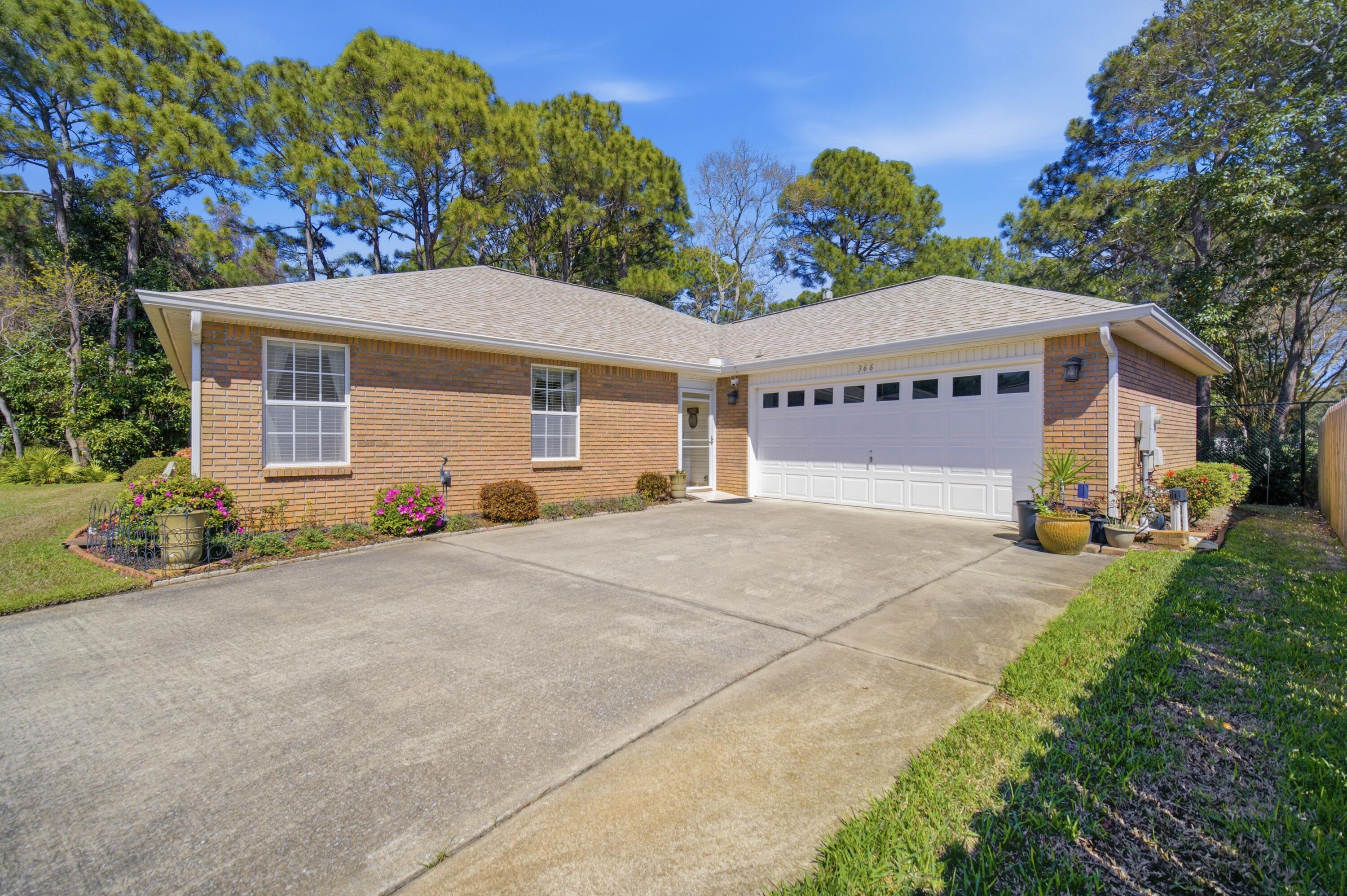 Located in the desirable Bayside community in Miramar Beach, this well-maintained 3-bedroom, 2-bath home offers an exceptional opportunity just minutes from the Gulf. Built in 1996 and thoughtfully cared for, the home features a new roof, new HVAC system, and new water heater. The spacious layout includes a large living area with vaulted ceilings and a gas fireplace, creating a warm and inviting atmosphere. A bright Florida room offers additional living space and the perfect spot to relax while enjoying the privacy of the wooded area behind the home, where no future development is planned.  The property also includes a two-car garage, irrigation system, and a generously sized driveway. While the home retains its original finishes, it presents a fantastic opportunity for buyers to update and personalize to their own style.

Residents of Bayside enjoy access to community amenities including a swimming pool, tennis courts, and a dock for fishing and relaxing by the water.

The location is hard to beat--just minutes from the white sand beaches of the Emerald Coast, and within close proximity to shopping, dining, and entertainment at Silver Sands Premium Outlets and Grand Boulevard at Sandestin.

Whether you're looking for a primary residence, second home, or investment opportunity, this property offers incredible potential in one of Miramar Beach's most convenient locations.