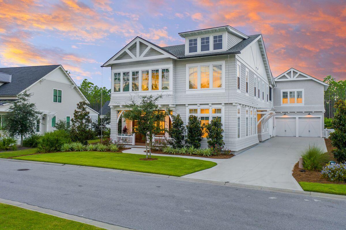 Masterfully Designed Southampton Inspired Home with Outdoor Oasis.

Meticulously maintained and expertly crafted, the one-of-a-kind Nantucket-inspired retreat at 55 Seastone Court embodies the pinnacle of design and craftsmanship within the WaterSound Origins community. Masterfully designed by Chris Stoyles, this purely custom 4,625-sq.-ft. single-family residence on a premiere estate lot offers refreshingly creative interiors, hand-chosen finishes and architectural elements rarely seen in the popular family-focused community. 

Spanning across a two-story main house and a one-bedroom carriage house, five bedrooms are offered in total, as well as multiple living and entertainment areas, perfect for multigenerational living or simply those craving the rarity of space along the coast. The main level of the home provides a primary suite with custom closets and bath, a powder room, private office with floor-to-ceiling windows and an open-concept living-dining-culinary space. Outfitted with brass-trimmed Wolf appliances, custom imported plumbing fixtures and custom Marquis cabinetry showcased throughout, the chef's kitchen is an idyllic place to spend time preparing meals or simply enjoying time with friends and family. 

A grid pattern ceiling is showcased in the living room, outlined with Euro-Wall doors leading to the oversized screened porch on the main level and an expansive outdoor living area with covered fireplace and seating area, as well as a custom-designed heated infinity pool and sunning deck. Upstairs in the main house, a junior primary suite offers convenient living, while two additional bedrooms, a guest laundry room and theater room/second family room provide ample accommodations and convenience for all who spend time within the home. 

A stainless cable staircase offers a hint of modernity to the Northeast-inspired property, while high-end details such as Caliza sinks, Sub-Zero refrigerators and wine chillers, and beamed ceilings ensure detailing is prevalent throughout. 

Additional features of this magnificent home include robust mahogany front entry doors, a two-car epoxy-floor garage with extra-height ceilings, a powder bath with exterior entry next to the pool deck, and an elongated driveway for ample parking and privacy.