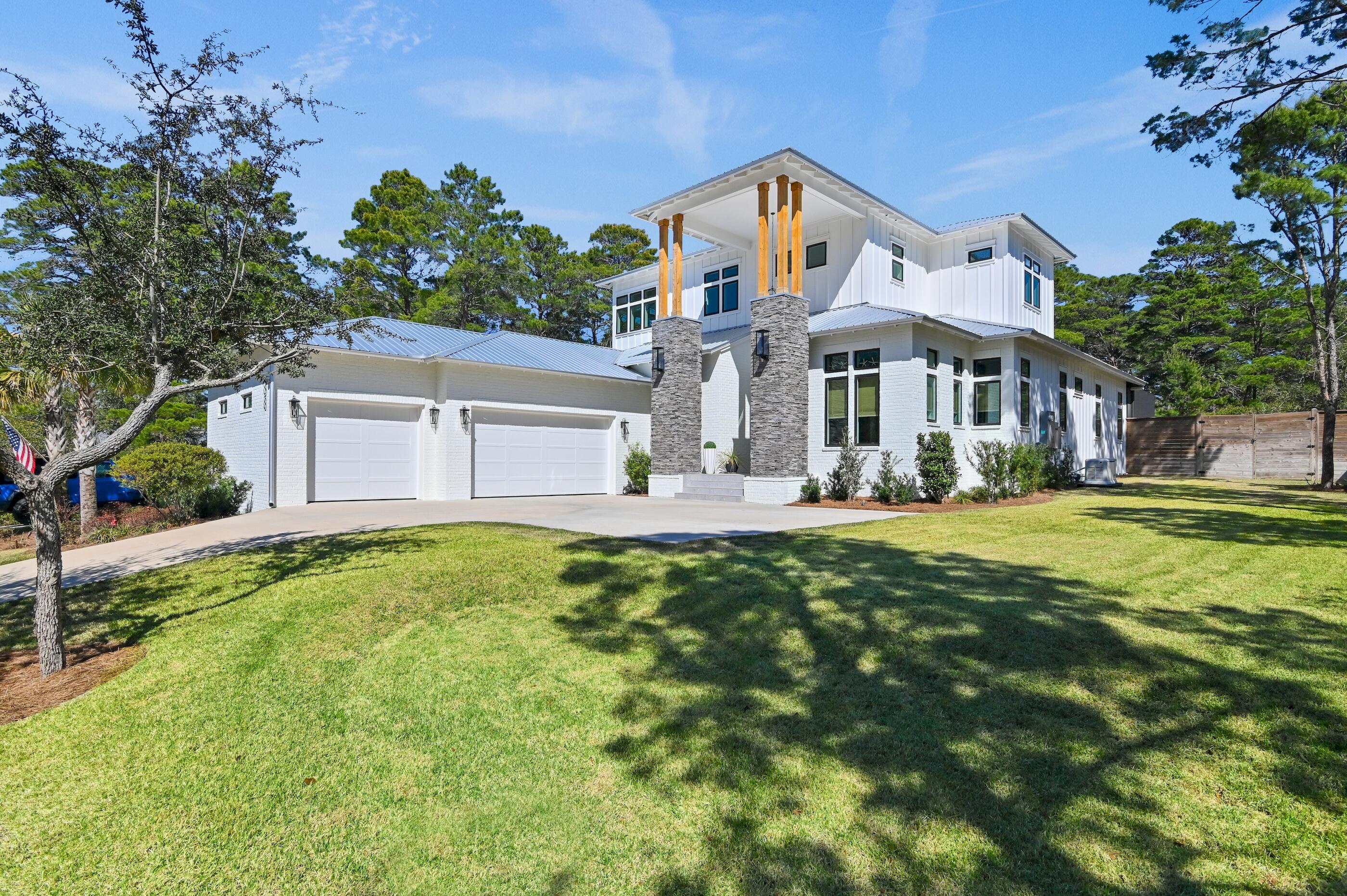 Beautiful Home in a serene cul-de-sac along 30A, this custom built 4-bed, 4 full + 2 half-bath estate is a 3,366 sq ft sanctuary of elegance. Over 5,000 sq ft under roof, with nearly 1,000 sq ft of screened poolside bliss. Invite effortless entertaining and relaxation. A Monogram-appointed gourmet kitchen inspires culinary artistry, while the gas-heated pool, spa, and summer kitchen promise endless outdoor indulgence. Premium finishes, whole-house generator, 3-car garage,  extra driveway, and BONUS ROOM heated/cooled w/its own window and door to a separate fenced area; adding comfort and convenience. Ask about the 3rd garage bay!! Turn-key options make this an exceptional 30A opportunity. ~ Seller measured distance to BEACH it is only 9/10 of a mile to Ed Walline Beach Access!