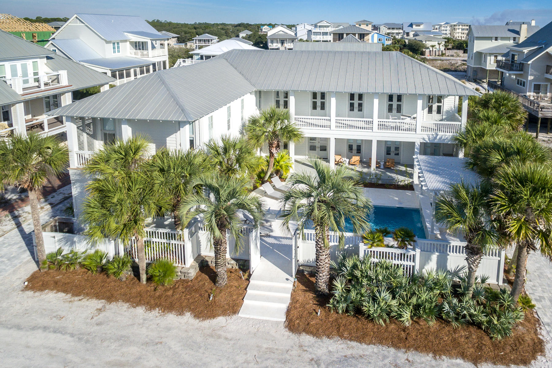 Personifying the 30-A lifestyle this 6 bedroom home is like new after a full home renovation inclusive of floor plan re-envisioning. Featuring 5 king bedrooms plus bunk room, direct GULF VIEWS and a stunning pool/spa with poolside cabana, this home represents a STRONG rental opportunity or private residence. Fine luxury interiors feature exemplary collaboration including Beau Interiors and Restoration Hardware. A chef's kitchen with large 6 burner gas range and waterfall edge quartzite center island join open concept living creating an entertainer's dream. Ensuring comfort for all parties a living room is found on each level while a true master suite is found on the 1st and 2nd levels. Thoughtful orientation captures mesmerizing western sunsets over the sugar white dunes of Grayton Beach State Park. The beach is only steps away but no need to leave the residence with a sparkling 26x12  pool and 7x7 spa surrounded by travertine paver decking adjoining the poolside cabana complete with outdoor tv and kitchenette.  The choice is yours, toast the evening away from your private spa or while watching the sunset from your second level terrace?