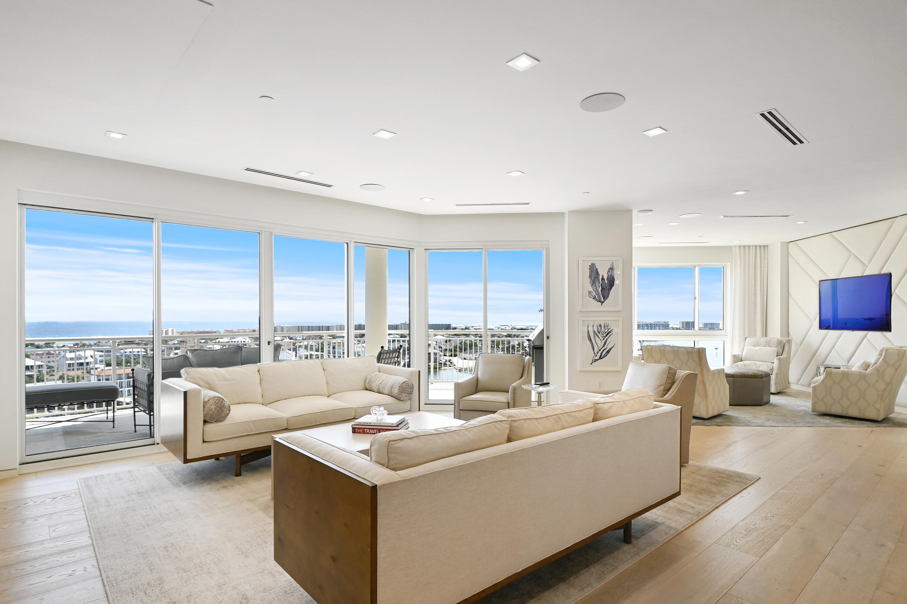 Luxury waterfront living at its finest...this Grand Harbor Penthouse, the crown jewel of Scenic Harbor in Destin, is a masterpiece of meticulous design and functionality, spanning two floors, with an elevator, including breathtaking views of the Gulf of Mexico, Destin Harbor, East Pass, as well as the Choctawhatchee Bay.  Relax on one of your private balconies while enjoying the most beautiful sunset views anywhere!  Beautiful modern furnishings selected by Lovelace Interiors. This furnished, completely renovated property is also complete with top-of-the-line Miele kitchen appliances...refrigerator/freezer, double oven, two dishwashers, steamer oven, built-in coffee maker, and warming drawers.  It also offers exquisite interior décor by a local high-end designer.  Beautiful accessories, and state-of-the-art electronics fill the home. Included with the condo is your private 70' deep-water boat slip with a 30,000 lb. capacity boat lift, allowing convenient and easy access to the beautiful clear emerald waters of the Gulf and the Bay. Exquisitely renovated and completely redesigned, this Grand Harbor penthouse is elevated to even greater heights of luxury, making it the most sought-after residence in the area.
Everything has been carefully crafted to provide the ultimate in comfort and sophistication and includes even more luxurious features, including a heated swimming pool and a hot tub (just resurfaced last year) that are perfect for relaxing and watching the boats go by on the harbor. The dock resurfacing just finished completion. The landscaping is currently undergoing renovations.  The lobby, Harbor View club room, conference room, and guest amenity suite just completed their renovation and remodeling.  There's an exercise facility as well, with fantastic views.:

Located on the most picturesque spots on the Emerald Coast, this property offers access to world-class beaches with sugar-white sand and emerald waters that rival those of the Caribbean. Few opportunities of this caliber are ever been offered in Northwestern Florida.