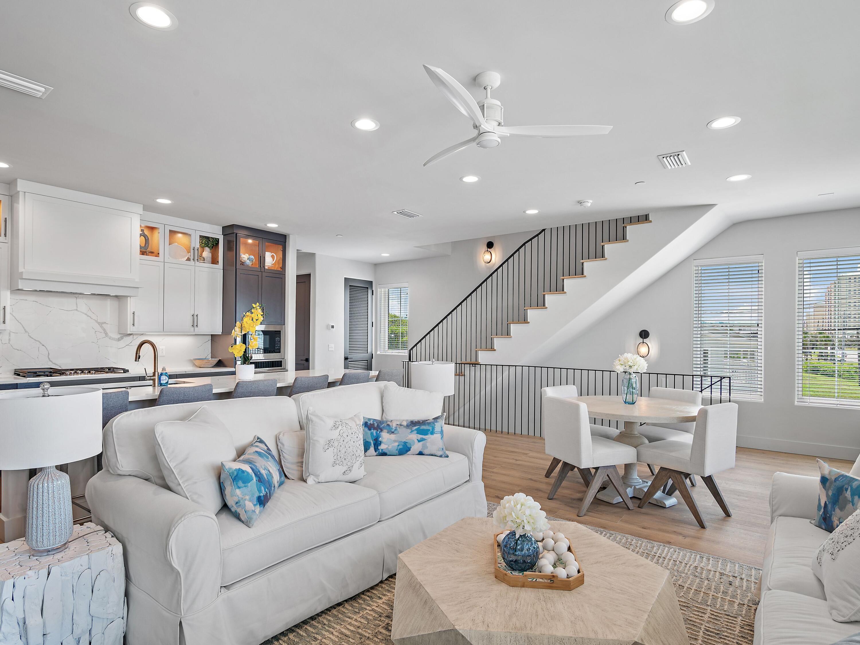 Experience elevated coastal living in this brand-new, fully furnished 4-bedroom, 4.5-bathroom townhome spanning 2,469 square feet, located directly across from the beach in the heart of Laguna Beach on Panama City Beach's serene west end.

Every detail of this residence has been curated for luxurious comfort and refined coastal style. Each unit has been fully outfitted with local designer finishes, blending texture, tone, and quality craftsmanship to create a truly turn-key experience — whether you're seeking a personal retreat or a high-performing rental investment.

Wake up to sweeping gulf views from your primary suite, complete with its own private balcony — ideal for morning coffee or evening sunsets. The thoughtful layout also includes a second primary suite, a spacious king bedroom, and a custom built-in bunk room to accommodate guests in style and comfort.

Inside, enjoy an airy, open-concept living space that flows onto a tiled balcony framed by natural V-groove ceilings. Premium features include GE Monogram appliances, gas cooktop, solid core doors, private elevator, and ensuite bathrooms for all bedrooms. The home is constructed with concrete and wood, with reinforced rebar-filled, 8" concrete separation walls for added soundproofing and structural integrity.

Additional highlights include a two-car garage, two-car carport, and access to a community pool shared by only five townhomes.

Built to exceed expectations, the home incorporates advanced systems like Gold Bond waterproof sheathing, Schluter bathroom waterproofing, concrete band headers, and an individual fire suppression system  combining peace of mind with enduring value.

Unmatched Location & Lifestyle: Perfectly positioned just a short stroll to Thomas Donuts and Carousel Grocery, this west-end gem is also less than 3 miles from Pier Park  Panama City Beach's premier shopping, dining, and entertainment hub. Explore over 120 stores, Grand IMAX Theatre, Dave & Buster's, and SkyWheel, with exciting new attractions like Topgolf and Dolly Parton's Pirates Voyage Dinner & Show on the horizon.

And when you're ready for more upscale coastal charm, the famed beach towns of 30A are just 15 minutes away, offering boutique shopping, award-winning dining, and timeless Florida beauty.

This is more than a home  it's a lifestyle defined by design, comfort, and convenience. Schedule your private tour today and step into a fully realized beachside retreat.