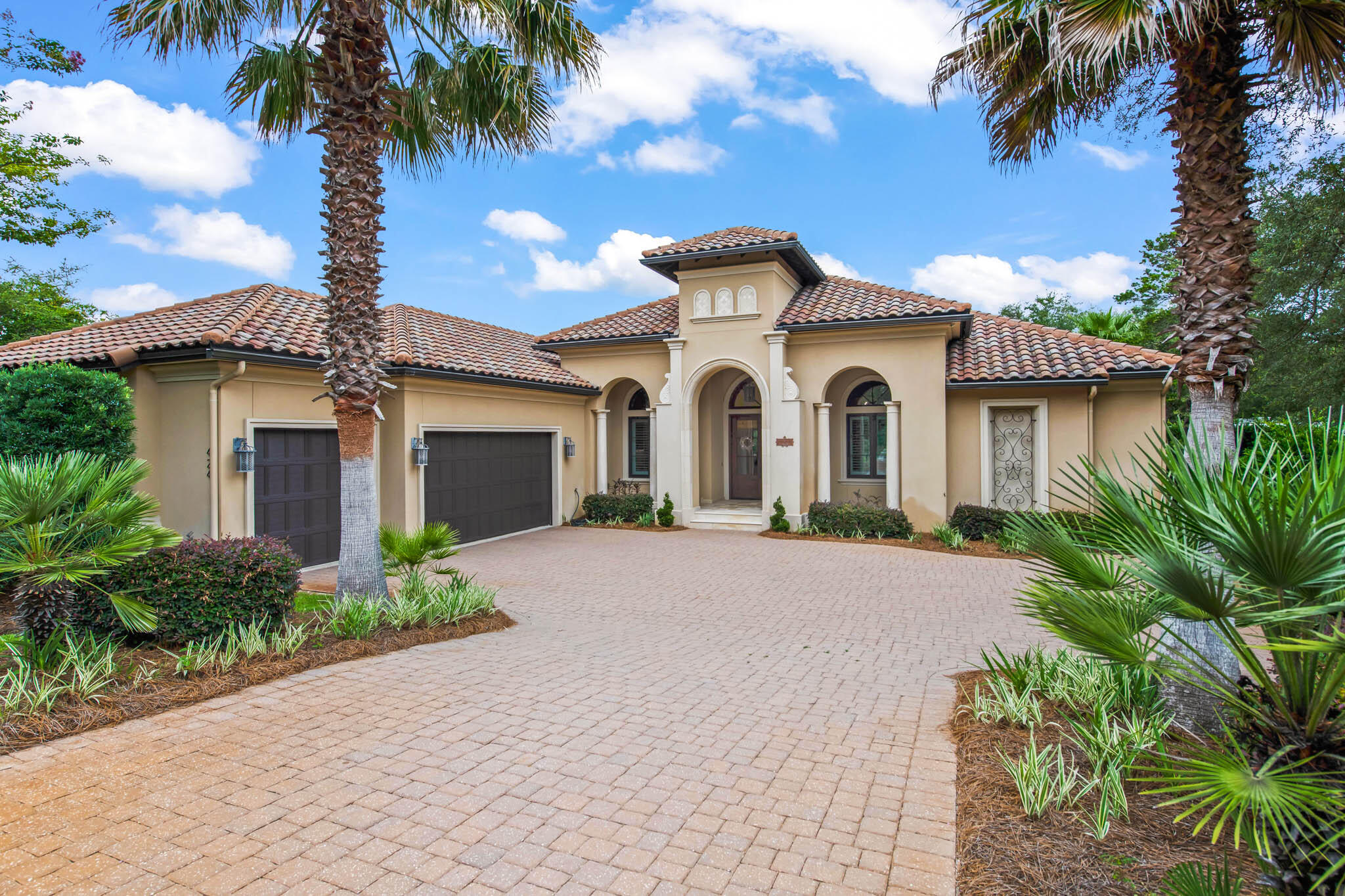 Exceptional location along 30A's west end with private gated access! Bellamar homeowners enjoy neighborhood walking paths that span from the west towards Gulf Place Town Center. The Vue on 30A and the Santa Rosa Golf & Beach Club are directly south of the gated entrance. 424 Emerald Ridge has been meticulously maintained and is move in ready! The cohesive design consists of a split floor plan with a private master suite and 3 additional bedrooms, plus a dedicated office. It is the perfect one level layout for families or for entertaining guests. In the heart of the home, the kitchen features a curved vaulted ceiling above the large island, Viking stainless steel appliances, granite, and white brick backsplash. Views of the screened lanai with double sided fireplace overlooking the custom saltwater pool, can be enjoyed from the great room and master bedroom. The elegant master bath consists of a claw foot soaking tub and walk-in shower with rain head. Interior features include: crown molding throughout, plantation shutters in beds & bathrooms, natural wood shades in the living room. Pecky cypress accents can be found in the master bedroom, guest bedroom wing, and in the lanai. The heated saltwater pool with travertine tile surround includes a tanning ledge, multi-function led lights, water & fire features.