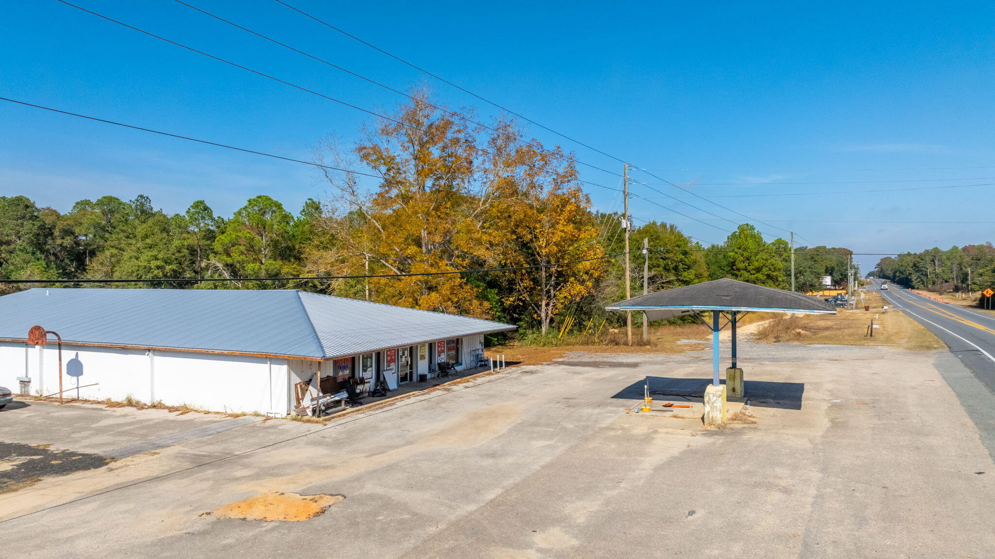 Great Investment Opportunity!
This versatile commercial building offers 7,900 sq ft under roof, including 5,216 sq ft of heated/cooled space and a 1-bedroom apartment--perfect for living onsite while operating your business.
Previously home to a well-known local store that has served the community since 1980, this property is ideal for reopening a store/ gas station and/or deli to meet the needs of this rapidly growing area.
The owner is open to seller financing, making this an even more attractive opportunity.
Contact me for complete details!