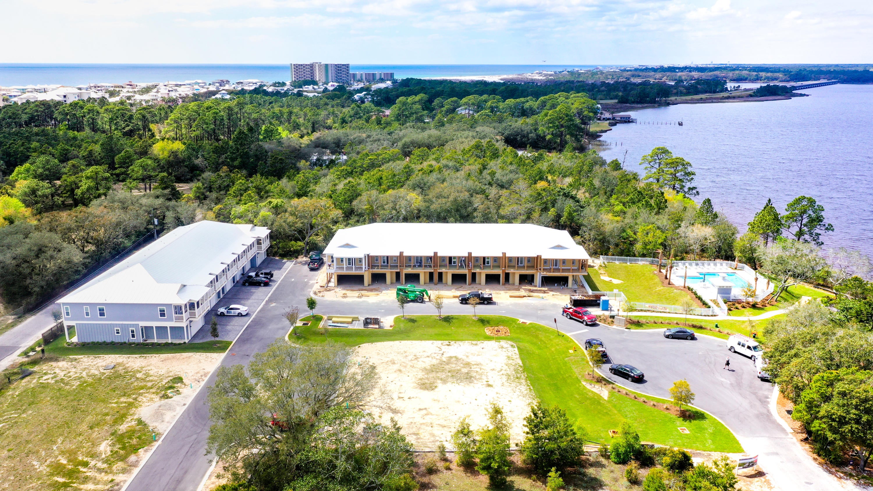 LAKEFRONT LIVING - New and move-in ready! See 'Virtual Tour' under 'Photos' for spectacular video. Miller's Landing is situated in a beautiful, waterfront community on Lake Powell just 3 miles from 30A and 8 miles from Pier Park. Enjoy the relaxed waterfront lifestyle of boating, kayaking or paddle boarding on the lake or going to the beach. The complex will have a total of 25 townhomes, a lakefront pool and a dock on Lake Powell. This spacious townhome offers a one car garage, 9 foot ceilings, stainless steel appliances, granite countertops, walk-in laundry room, all wood cabinetry, LVP and porcelain tile flooring, and impact rated doors and window Each townhome has an oversized balcony with awesome views. Boats and jet skis are allowed on Lake Powell and a public boat ramp is nearby. This community has a 30 day minimum rental restriction.
