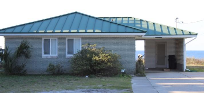 Location! Location! This charming one level cottage in Old Seagrove is just a short walk from Seaside and Watercolor. It sits atop a protective bluff with private walkover and features 3 bedrooms, 2 baths, an enclosed Florida room, a storage building and large deck for enjoying sizzling sunsets.
The site measures 60' x 174' with plenty of room to build a large multi-story home. There are two popular nearby restaurants just minutes away.
An owner can enjoy a stream of rental income with $67,645 already on the books as of February 20th. Make your memories at the beach in this home for the ages in Old Seagrove or design your dream home on this special site.