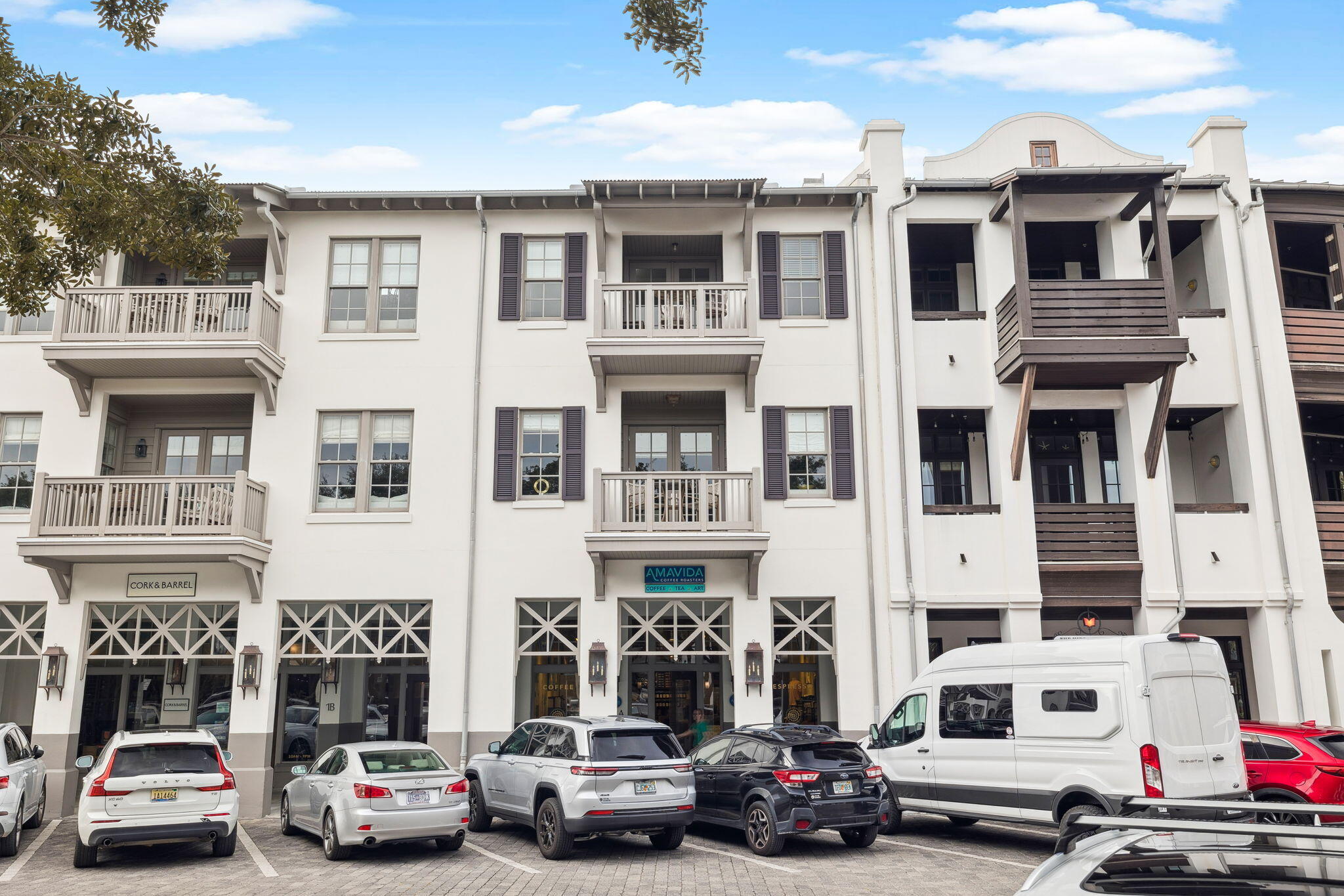 Completely renovated 2-bedroom residence in Lofts West, ideally positioned in the Town Center of Rosemary Beach. This thoughtfully redesigned condo blends refined finishes, high-end appliances, and extensive system upgrades, creating a move-in-ready retreat just steps from dining, shopping, and the beach.
The kitchen and dining areas have been fully reimagined with expanded quartz countertops with a counter-height bar overhang, complemented by a handmade Claypaper backsplash from Waterworks. Custom maple cabinetry includes additional built-ins and a wood panel detail on the bar side. Emtek natural brass hardware and appliance pulls add warmth, while undercounter LED lighting enhances both the kitchen and adjacent bar/laundry area. Premium appliances include a Thermador built-in counter-depth refrigerator with a double bottom drawer freezer. Bosch commercial-style induction range, Bosch 500 Series dishwasher, and Panasonic microwave. The laundry area features an LG washer/dryer and quartz countertop.
The primary bath is a full luxury renovation featuring Waterworks Ludow fixtures. Honed Statuary marble is used throughout the floor, shower walls, and ceiling, alongside a Kohler tub, glass shower door, new sconces, quartz countertops, and Kohler sinks.
The secondary bath also showcases Waterworks fixtures (Ludlow Volta sink and tub controls), quartz countertop, Kohler sink, and updated finishes.
Additional upgrades include fresh paint throughout, beautiful new furnishings, an A.O. Smith commercial-grade water heater with pan, and a Carrier Coastal Series HVAC system (replaced September 2022) designed for durability in a coastal environment. Sonos speakers in the living room and primary bedroom provide integrated sound.
A rare opportunity to own a fully updated, design-forward condo in the heart of Rosemary Beach with exceptional attention to both aesthetics and infrastructure.