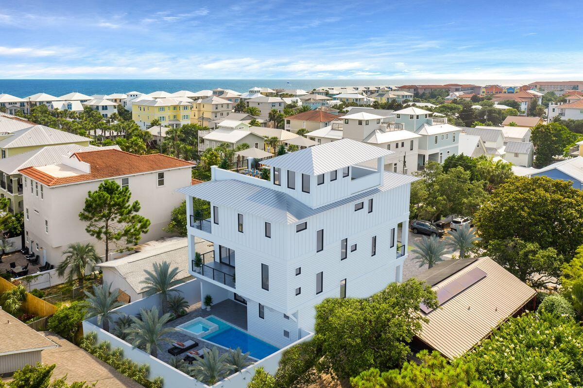 New construction and sleek coastal contemporary design perfectly situated to capture Gulf views and masterfully configured providing unparalleled amenities including a private resort style pool area complete with a covered outdoor summer kitchen. This is the ultimate beach house, set to be complete by September 2021, conveys fully furnished and will be an excellent income producer with $320,000 - $340,000+ in gross projected annual rental income. This home was designed to maximize functionality and finely appointed with chic contemporary finishes while affording optimal comfort and living space. Notable features include multiple indoor and outdoor living areas, large 24x48 Porcelain tile throughout and solid wood stairs, private commercial grade elevator that accesses three of the four floors, dual master suites and built-in bunk beds and a SubZero appliance package including gas range and wine cooler. The first floor layout boasts a spacious bunk room, full size laundry area, large master suite as well as an industrial style game and family room complete with a pool table and wet bar flowing seamlessly out to the rear pool deck and covered, private outdoor living area. The second floor is the focal point of indoor living space with a sleek contemporary living room featuring floor to ceiling windows to soak in natural light, opening up to the kitchen and dining area for optimal flow. The ample sized kitchen features custom contemporary cabinetry, a gas range, ample storage and is anchored by a massive center island crowned with gorgeous quartz countertops. The second floor also features an additional bedroom suite with ensuite bathrooms and a private balcony, separate bunk space and a convenient half bath as well as access to the second story outdoor balcony area overlooking the pool. The third floor features four bedrooms including a master suite with spacious porches offering gulf views and laundry area.  The fourth story can be accessed via stairs and offers incredible gulf views as well. 

Frangista Beach owners enjoy private, deeded beach access which is located a very short walking distance via Miami Street. Frangista Beach is centrally located just off Scenic Highway 98, just minutes in either direction, East or West, to a wide variety of some of the best restaurants, easy access to grocery stores such as Publix and Whole Foods, shopping at the Silver Sands Outlets, luxury boutique dining and shopping at Grand Boulevard, or enjoy family activities and events at nearby Sandestin and Baytowne. You truly are just a short walking, golf cart or bike to endless opportunities being in Frangista Beach.