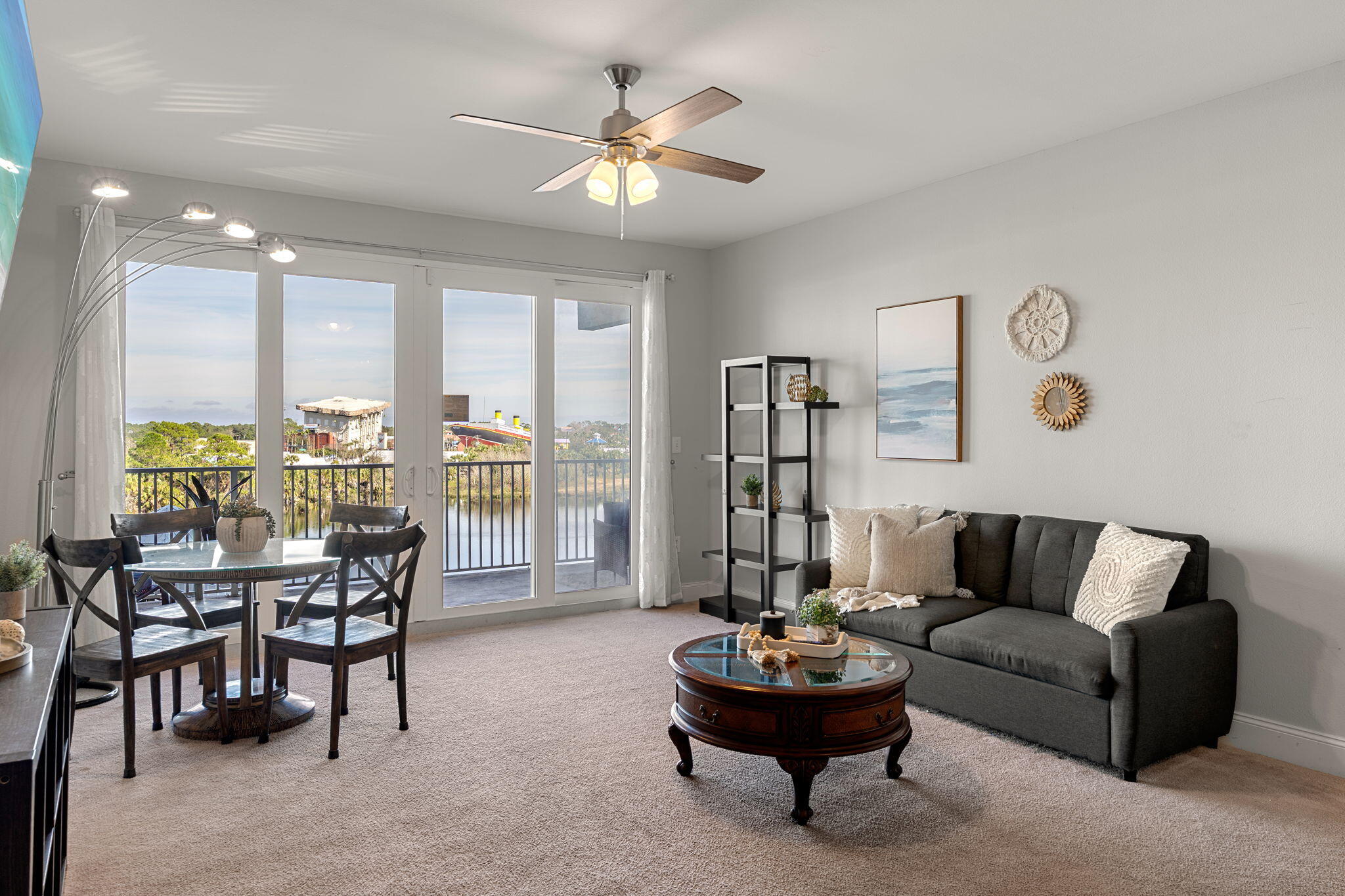 Wake up to serene lake views and step into the heart of everything Panama City Beach has to offer! This fully furnished 2-bedroom, 2-bath condo with a bonus bunk room comfortably sleeps up to 8, making it ideal as a vacation getaway, rental investment, or both. Enjoy peace of mind with a brand-new 2025 hot water heater, gulf views from guest bedroom, granite countertops, and an oversized private balcony perfect for morning coffee or sunset unwinding. Located just steps from the world-famous white-sand beaches, shopping, dining, and entertainment, this beachside resort delivers true resort-style living. Laketown Wharf boasts unmatched amenities, including five unique pools, a Kids Funscape playground, Splash Bar & Grill, Gulf-view fitness center, covered garage parking, and convenient -->> beach access. Stroll along the 52,000-square-foot lakefront boardwalk, explore onsite market shops, and end your evenings with the nightly fountain and light show. With views spanning the Gulf of Mexico, lake, and golf course, Laketown Wharf offers one of the most dynamic and sought-after locations on the beach. Turn-key and perfectly positioned this is Panama City Beach living at its finest!