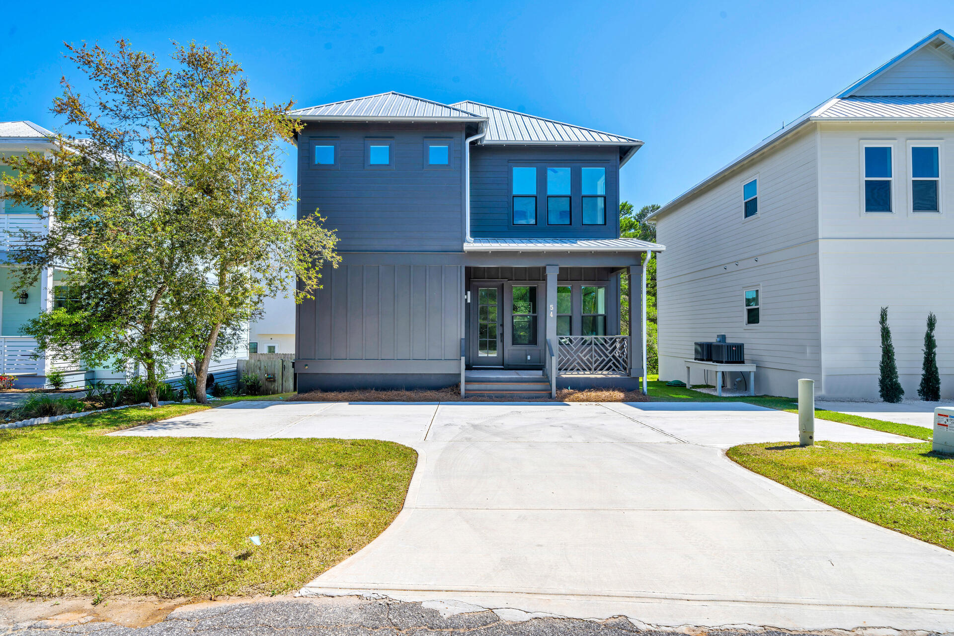 Coastal Living at its finest in the quaint and quiet Blue Mountain Beach community.  In the sought after eclectic Brickyard neighborhood.  Upgrades throughout home, shiplap galore, high end appliances, custom bathrooms and Furnished for immediate turnkey resale.  Home has not been occupied permanently and has only had a few select short term stays.  Home originally sold as a family gift now ready to sell.