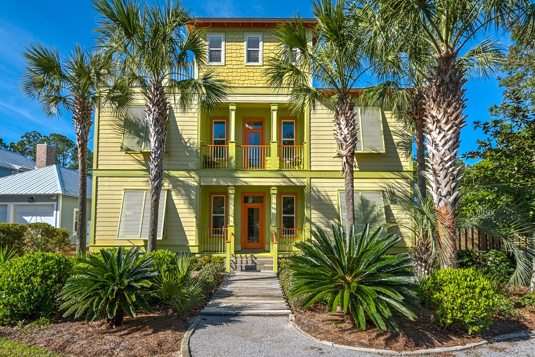 This beautiful Gulf View 4 Bed 4 Bath home is South of 30A, and less than a 5 min walk to the sugar white sand beaches of the Emerald Coast. Bright, colorful beachy decor. All bedrooms feature custom built in closet-cabinets with decks from all three floors to expand your living space. 10' ceilings, hardwood floors, tile bathrooms . Spacious kitchen with counter space galore, all stainless steel appliances, separate ice maker and sparkly stone counter tops. Large living and dining area that leads out to the back deck which is set up for grilling. Large private outside shower with hot and cold water to wash off the sand after your beach time, plus a raised private pergola and heated pool for relaxing evenings after a day at the beach. The spacious master bedroom has a built in window seat on the second floor. The master bath features double vanities, marble tile floor, and pretty silestone counter tops as well as a separate walk in shower and a jettted tub. Additionally, there is the bunk room with two custom bunks and built in storage. Third floor is the sizable tower room which opens onto a huge south facing sun deck with great gulf views. Equipped with wet bar, refrigerator, and a wine cooler, it is perfect for toasting stunning sunsets, and the stars that follow, or for soaking up some sun without going to the beach. There are more window seats with comfy cushions and built in storage, affording plenty of room to stretch out and catch up on reading or napping when the party is still downstairs!