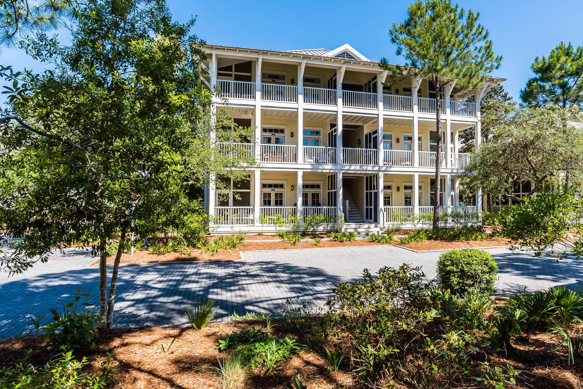 This recently refurbished, 2 bedroom, 2 bath end condo unit with a bonus bunk room is in immaculate condition and overlooking Cerulean Park in Phase I of WaterColor! Located a short walk from the sugar-white sand beaches of Scenic Highway 30-A, and just a short bike ride to Seaside and WaterColor shopping and dining venues, this location will not last long! With a newly painted interior and wood floors throughout, this condo welcomes you to WaterColor with soaring ceilings, vast windows and the perfect hues of blue to remind you that you've made it to the beach. Sit back and enjoy the relaxing sounds of the neighboring fountain as you revel in your morning cup of coffee from one of this condo's two covered porches. Spacious windows with transom lighting brighten the space, allowing in a great deal of natural light. The expansive master suite offers a spacious master bath with a jetted garden tub and separate shower. The vast guest suite offers an attached full bath with an additional door that makes it perfect for guests. This condo is located in the first building at the front of WaterColor, close to the WaterColor Town Center and just steps to the beautiful beaches of South Walton! This is one of the best locations in WaterColor! A must see! Elevator access!