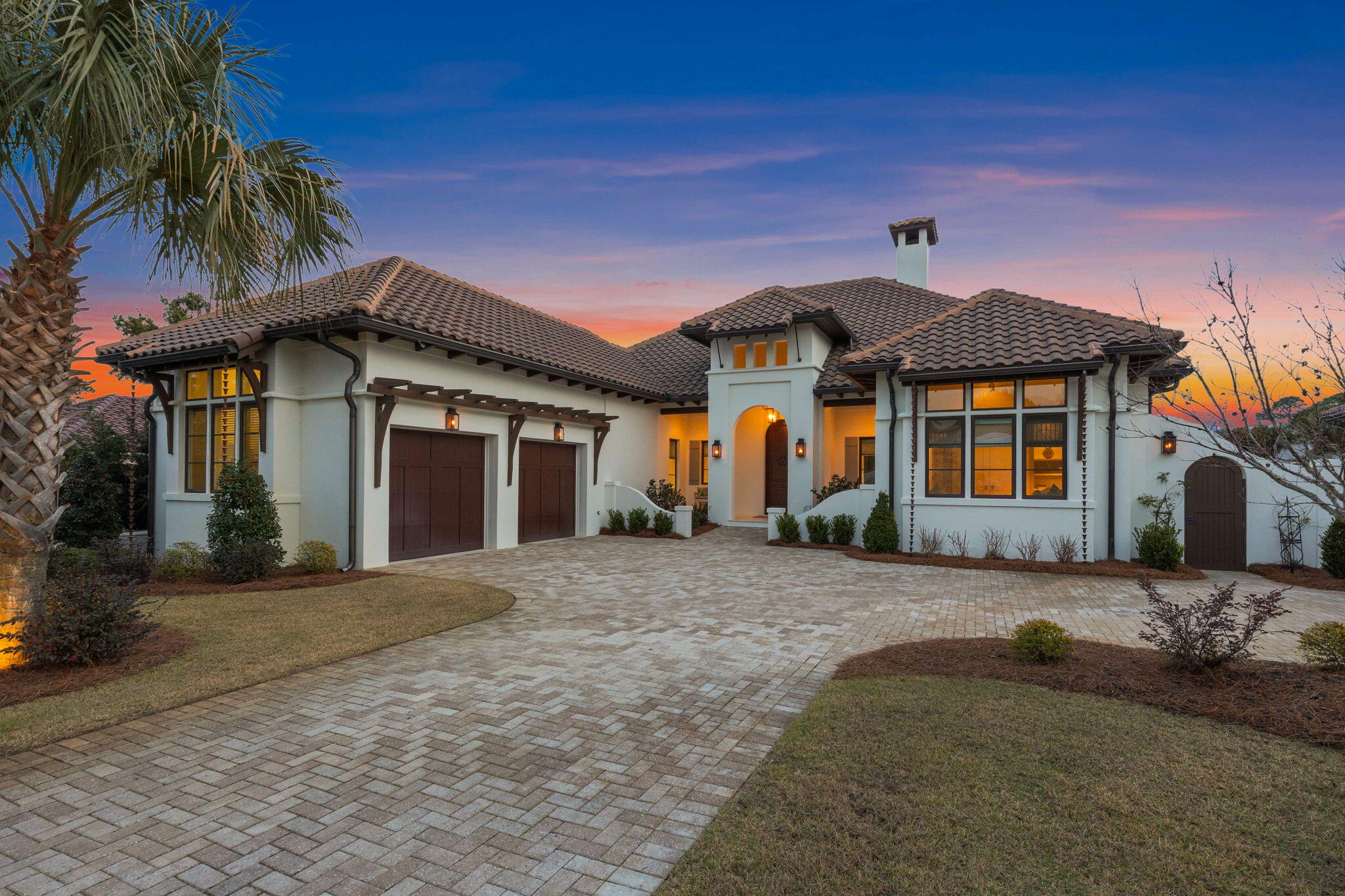 Nestled within the exclusive BellaMar at Gulf Place, this newly constructed coastal retreat offers unparalleled luxury and serenity. Set on a private .36-acre lot in a gated, rental-restricted community, this ICF block home features 4 bedrooms and 4 bathrooms across 2,927 square feet of thoughtfully planned living space. The home sits approximately 35 feet above sea level, providing a sense of prominence on the lot and contributing to the overall expansive feel of the property. Enjoy a 5-minute walk along the neighborhood's walking path to Gulf Place restaurants and Ed Walline Beach, the perfect spot for watching breathtaking 30A sunsets.

As you step through the custom curved wood front door, you are welcomed into a bright and airy foyer, leading into the expansive great room with soaring 18' cathedral ceilings featuring stunning pine tongue and groove paneling. This room is defined by the warm, textured backdrop, capturing the essence of coastal elegance. The updated lighting throughout adds a refined touch, highlighting the natural beauty of the space and creating a welcoming ambiance.

An impressive 18-foot, 6-panel stacked glass slider opens up from the great room, offering breathtaking views of your private heated pool and hot tub. The seamless transition between the indoor and outdoor spaces invites relaxation and effortless entertaining, with lush landscaping and cypress trees creating a peaceful, secluded oasis.

The home's interior is thoughtfully furnished by Cindy McCarley Designs, bringing a coastal, gracious, and laid-back feel throughout. Each room is carefully styled with elegant textures, natural materials, and hand-selected furnishings, creating a harmonious balance of comfort and sophistication. The furnishings can be negotiated as part of the sale, ensuring a seamless transition for the new owners.

The master suite and poolside guest bedroom both feature vaulted pecky cypress ceilings, adding a touch of luxury and natural beauty to these private retreats. The updated lighting continues to accentuate the warmth of the wood and the elegance of each space, ensuring comfort and tranquility.

The open-concept kitchen is a chef's dream, featuring a 5-burner gas range, double oven, walk-in pantry, separate appliance storage, farmhouse sink, custom Venetian plaster range hood, wine refrigerator, and a generous 10' island - the perfect setting for cooking and entertaining.

Step outside to your private heated pool, complete with a hot tub, outdoor kitchen with built-in grill and cabinetry, and a cozy gas fireplace, ideal for both relaxation and lively gatherings. Surrounded by white hydrangea, cypress trees, and native landscaping, this outdoor space feels like a personal retreat. The front and back porches further enhance the home's coastal charm, each featuring stunning pecky cypress tongue and groove ceilings that match the interior paneling, creating seamless flow and providing the perfect setting to enjoy the outdoors in style.

This home also offers the convenience and peace of mind of a whole-house generator, ensuring you're prepared for any weather conditions or power outages, and providing uninterrupted comfort for you and your family.

Additional features include a large covered front porch, climate-controlled storage, a two-car garage. Designed by Greg Jazayeri and built by Coastal Custom Builders of NWF, this home showcases the highest level of craftsmanship and attention to detail.

Located just steps away from deeded beach access and in close proximity to local shopping, dining at Vue on 30A, and community walking trails, this property offers the best of coastal living.

This home is a true gem in Santa Rosa Beach, FL - a blend of luxury, comfort, and natural beauty, offering a perfect retreat for those seeking the ultimate coastal lifestyle. Furnishings are negotiable.