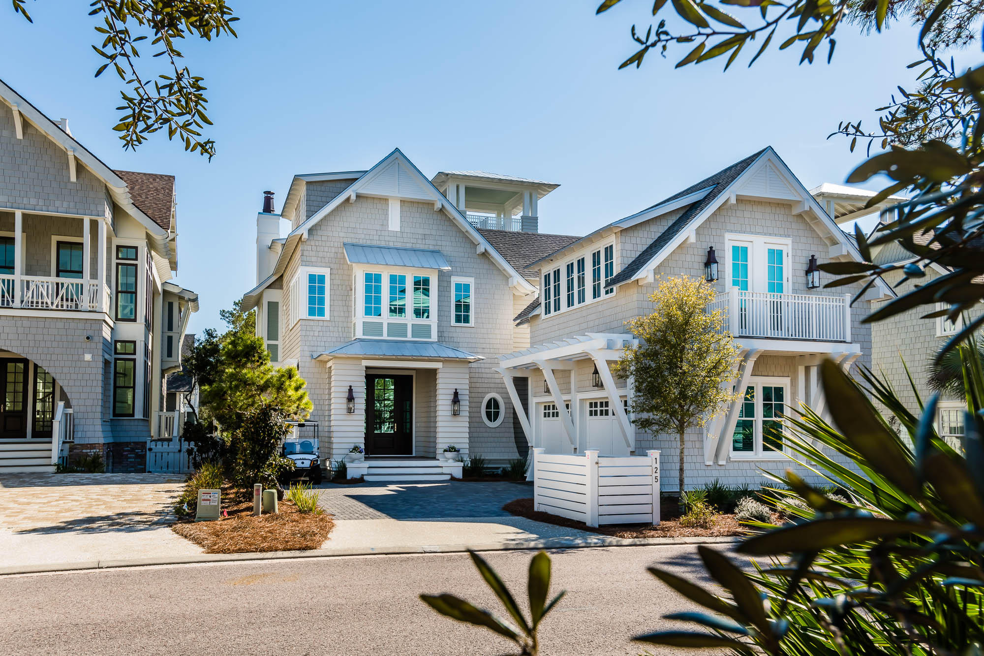 Within the exclusive gated community of WaterSound Beach, this brand new luxury residence, with attached carriage house and heated pool, was designed by TS Adams and built by Dune Construction and is prominently situated steps to the beach in Phase 1, boasting impressive Gulf views. The newly constructed home has rental projections exceeding $175,000 and offers all the comforts of beach living with an open floor plan, exceptional outdoor living and high-end finishes throughout. The living room, dining area, and kitchen are all conveniently located on the first level. The living area opens to the terrace and heated pool, outdoor shower and -1/2 bath. Pool is connected to a summer kitchen complete with fireplace, grill and refrigerator. The gourmet kitchen is complete with stainless steel appliances, 6 burner gas range, marble counter tops, and a built-in refrigerator, wine cooler and ice maker.  A junior master suite is located on the first level with views of the pool. The carriage home is attached over a two car garage.  Take the beautiful staircase to the second level to discover the main master suite which has an outdoor sitting area overlooking the pool.  Master bath has marble flooring in the herringbone design, tub, shower, double vanities, makeup counter and walk in closet . Two junior suites and laundry room are also located on this floor. The third level offers an expansive bunk room with built in desk, 293 square feet of heated and cooled storage space which is approved to be finished space, a full bath, wet bar complete with ice maker and refrigerator.  This opens to an additional porch and another flight of stairs to the fourth level tower which offers expansive views of the beautiful Gulf of Mexico.  This home offers plenty of extras including elevator, surround sound throughout, hidden storage, sprinkler system, 4 HVAC units, 3 tankless hot water heaters and two outdoor showers.  WaterSound Beach features a mile and a half of private deeded beach access with amenities including expansive boardwalks, pedestrian bridges, natural walking trails, parks, pools, fitness center and community rooms.  Home is centrally located to the best dining, unique boutique shops, bike paths and golf courses along the Emerald Coast. Easy access to Hwy. 98, allowing you easy access to Panama City and the new Northwest Florida Beaches International Airport.