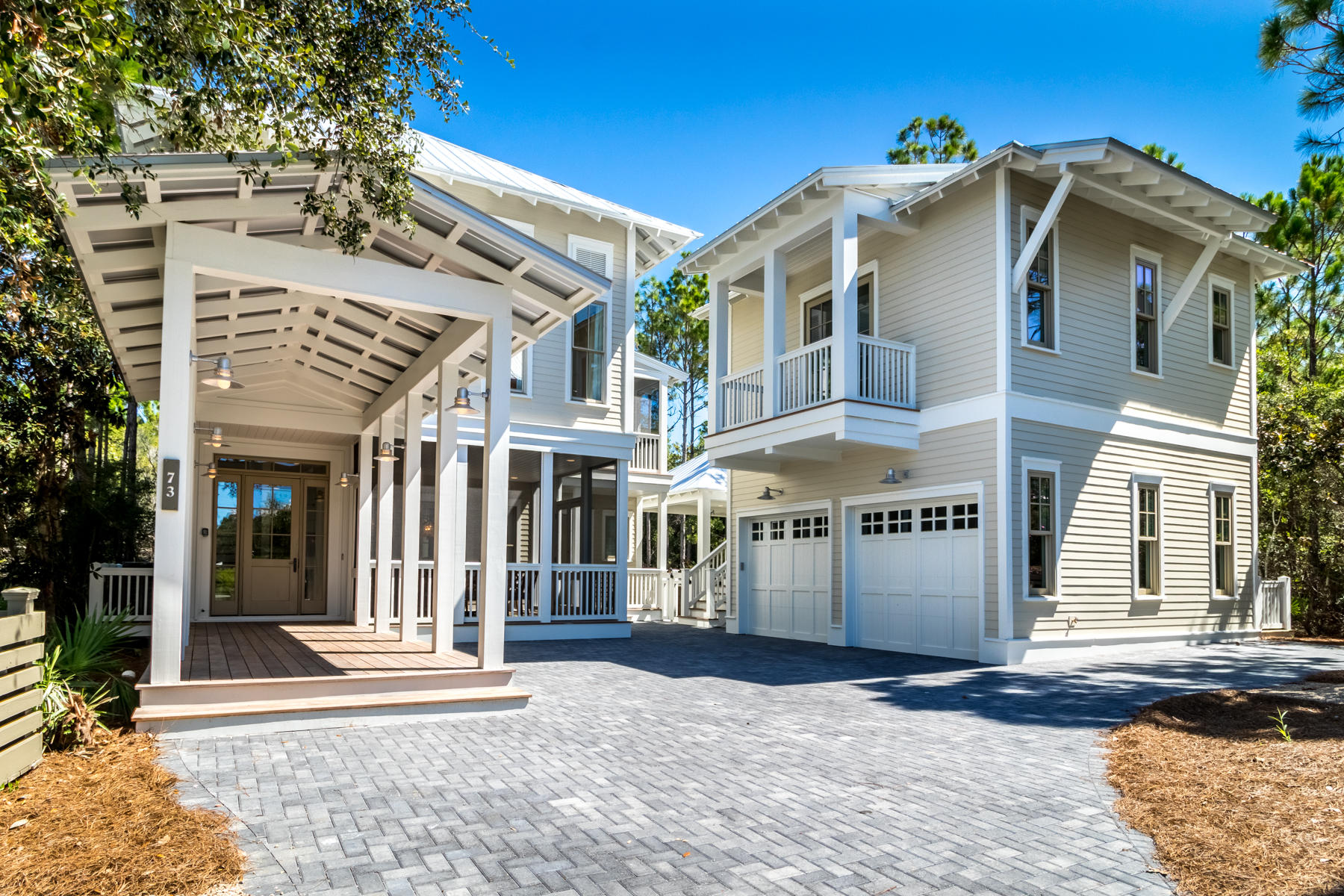 This newly rebuilt custom home by Romair Construction personifies the finest Watercolor lifestyle. 73 Pond Cypress is positioned on one of the most sought-after sites offering privacy and 180 degrees of serene wooded preserve. Vgroove shiplap walls, wire brush oak floors, white quartz countertops, glass beaded chandeliers combine with Bella Beach Interior designs to create coastal elegance perfection. This exquisite home has it all; alluring open layout, outdoor luxury retreat built for entertainment, multiple spacious porches, newly constructed carriage house, 2 car garage and additional parking for 4 vehicles. A crisp new home scent greets you as you enter this meticulous home with a seamless integration of the gourmet kitchen and expansive living area. An exceptional floor plan... considers 5 king ensuites, plus a 3rd level loft, including kitchenette, living area and custom twin over queen bunks. Ipe decking surfaces coupled with over-sized peacock stepping stones create an impressionable path to the customized swimming pool and pool-side cabana complete with outdoor fireplace and fully functioning summer kitchen. Full home indoor and outdoor Sonos sound provides smart ambiance for the complete experience.  

 Watercolor is a 499 acre resort community offering an array of recreational amenities, including a gulf-front Beach Club located along the Gulf of Mexico, Camp Watercolor with 3 pools and a lazy river, the Boathouse and Marina Park with access to paddle boards, kayaks and canoes, wooded trails for walking and biking, several community pools, parks and gardens, Tennis Center and a Town Center featuring locally-owned shops and a restaurants.